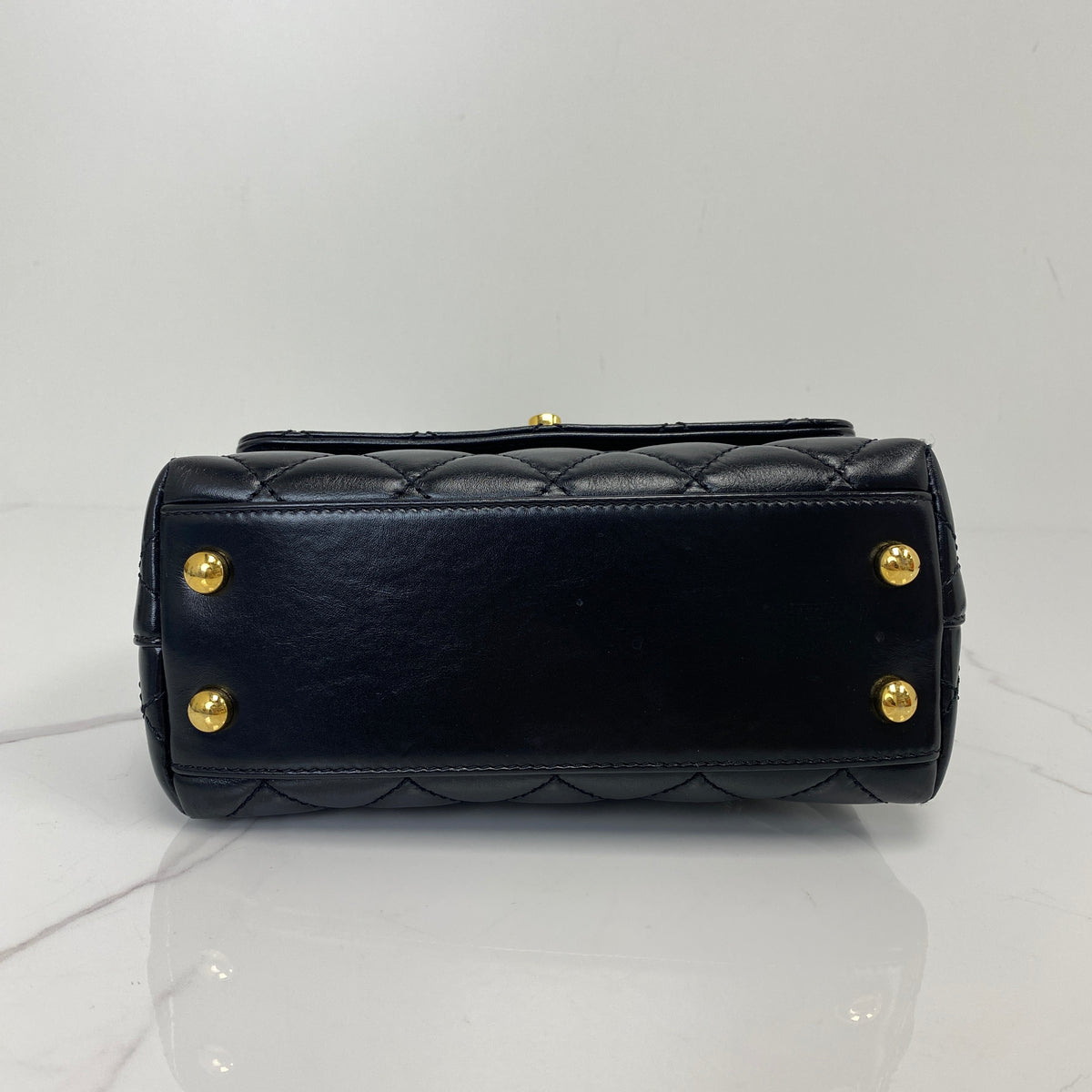 Chanel Mini Coco Handle, black shiny calfskin, gold-tone hardware — detail view 4