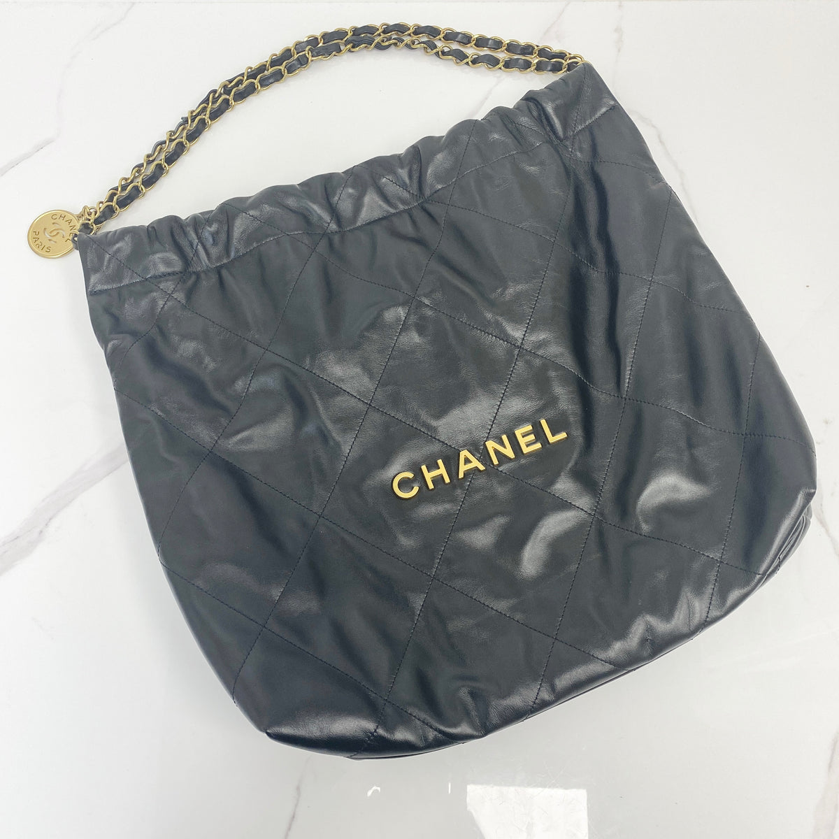 Chanel Small 22 Bag Black Shiny Calfskin, Black Shiny Calfskin, Gold Tone — front view