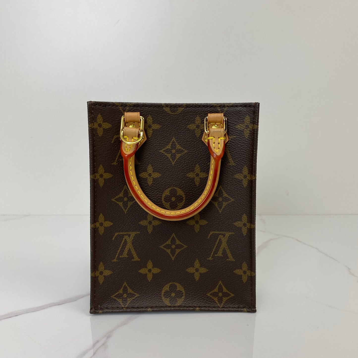 Side profile of the Louis Vuitton Petit Sac Plat