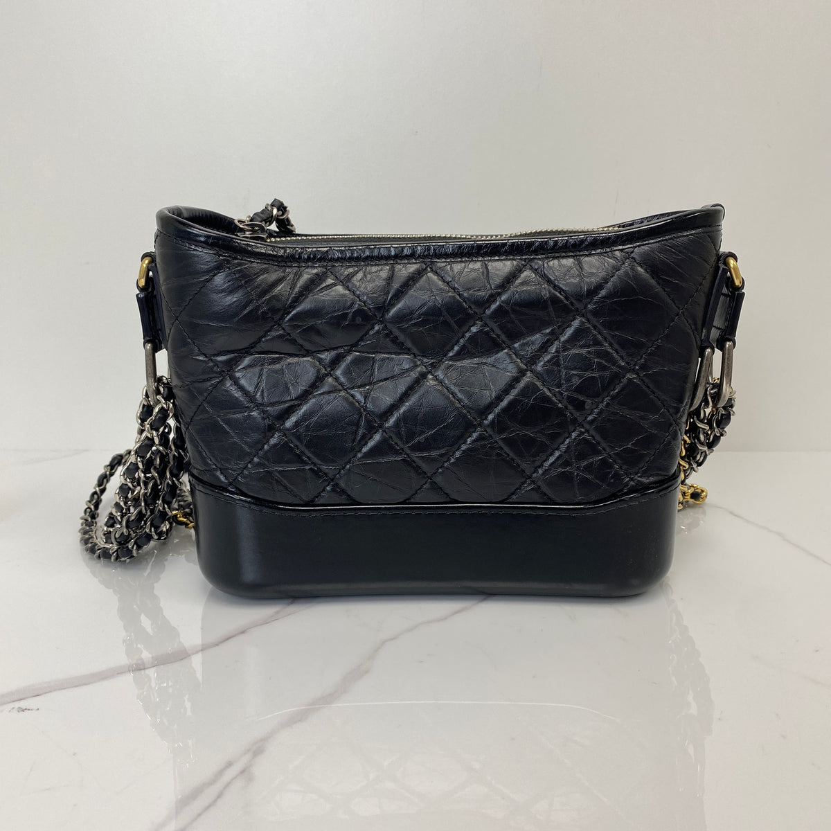 Chanel Small Gabrielle Hobo Bag Black Aged Calfskin, Black Aged Calfskin, Mixed Gold and Silver Tone — detail view 3