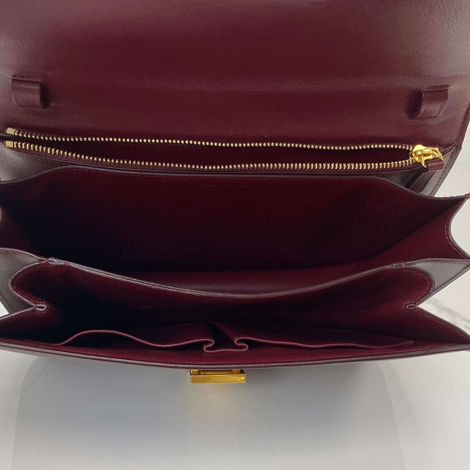 Celine Classic Box shown with its strap and dustbag