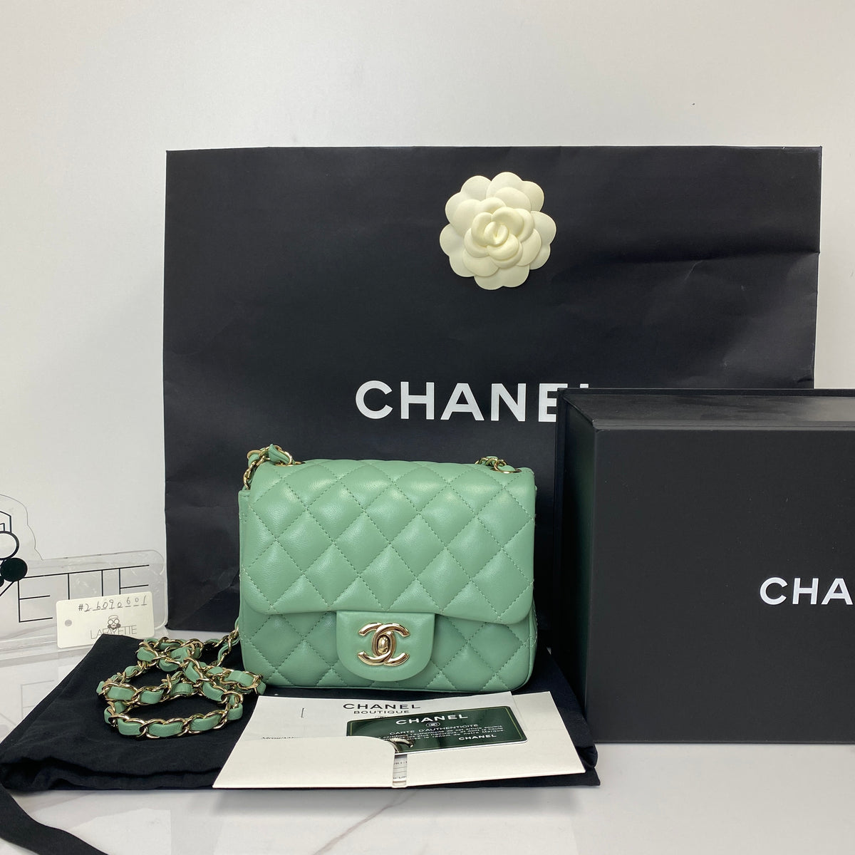 Chanel Classic Mini Flap Bag, mint green lambskin, gold-tone hardware — detail view 1