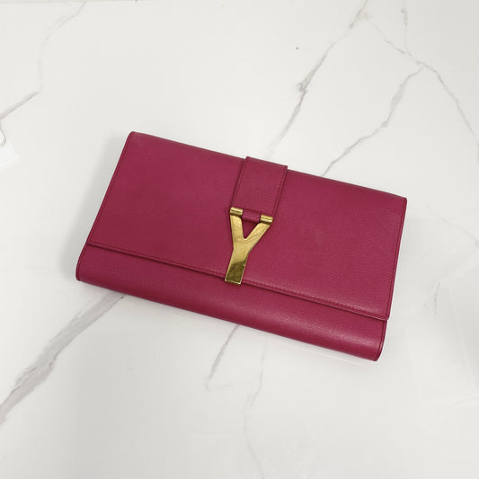 Saint Laurent Y Ligne Clutch, fuchsia pink calfskin, gold-tone Y closure — front view