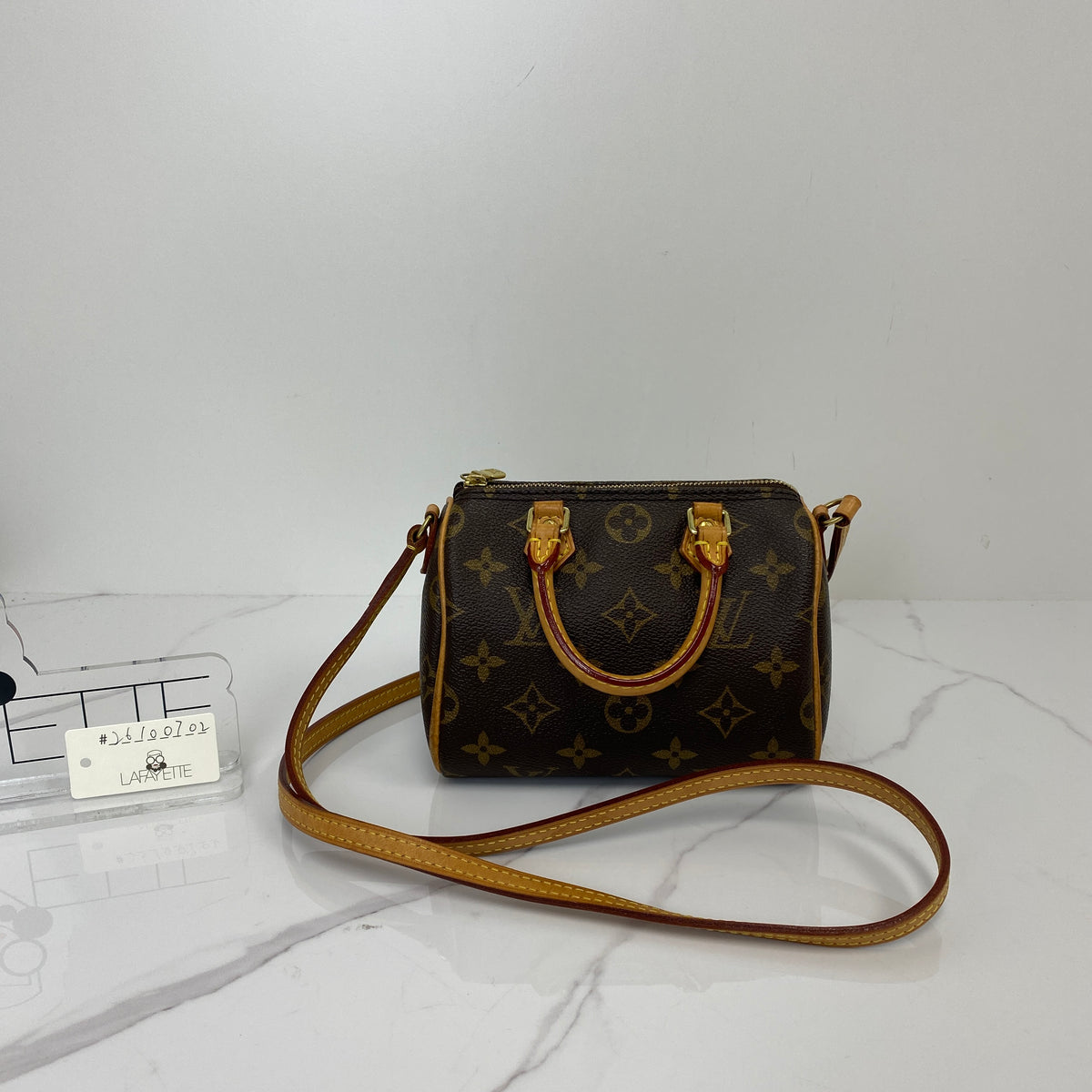 Louis Vuitton Nano Speedy Monogram, Brown Monogram Coated Canvas, Gold Tone — detail view 1