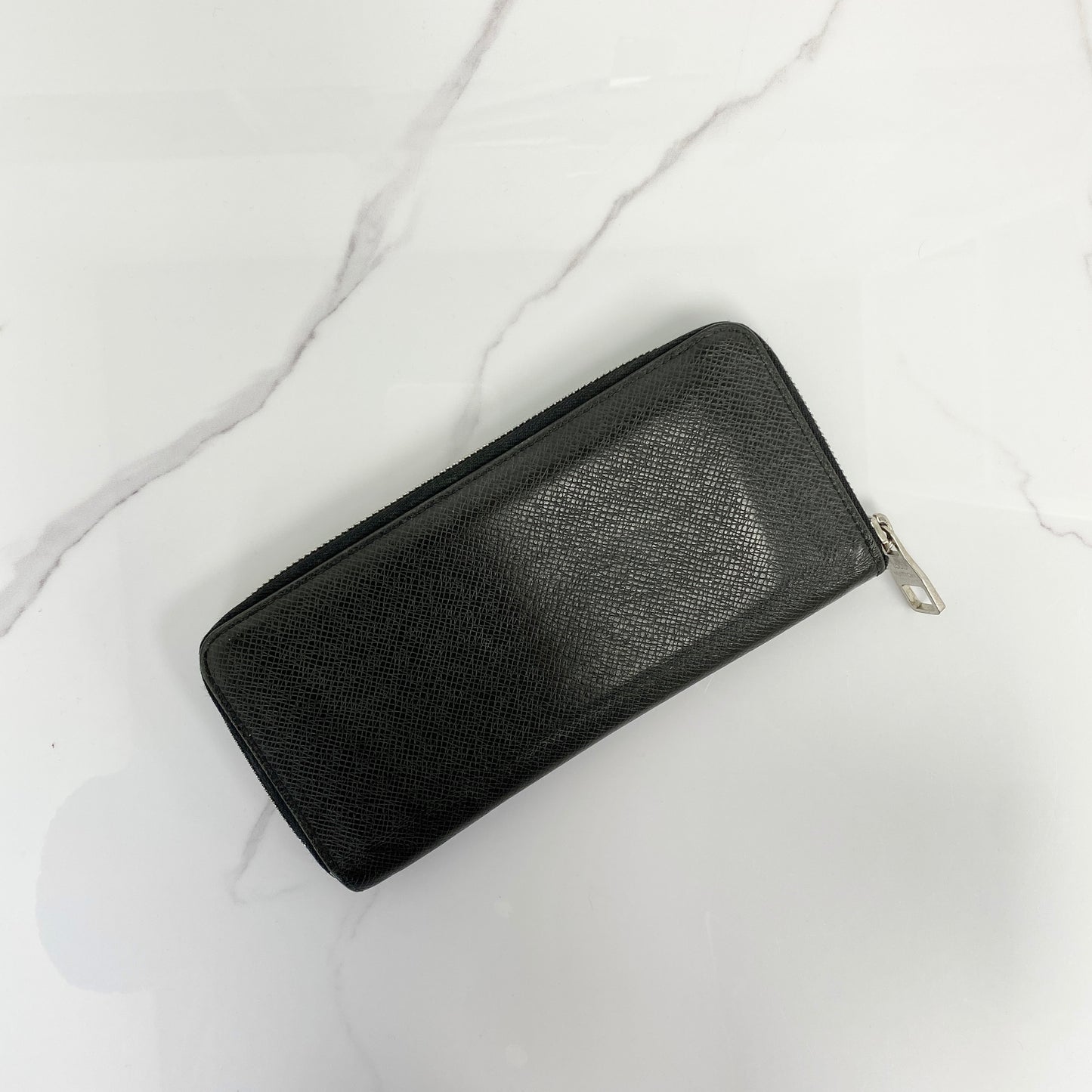 Louis Vuitton Zip Long Wallet in black calfskin with silver-tone hardware