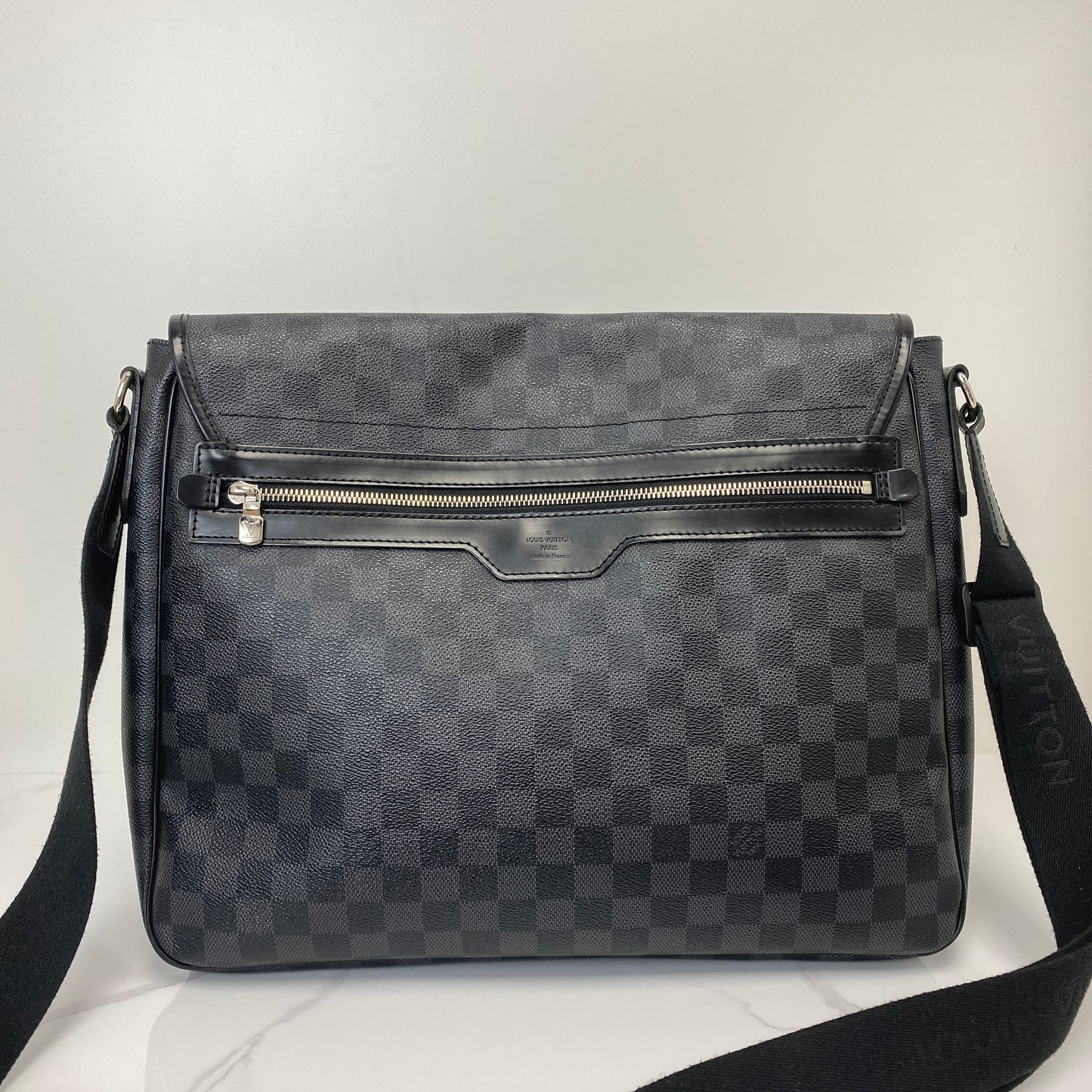 Louis Vuitton Damier Graphite messenger shown with its dustbag
