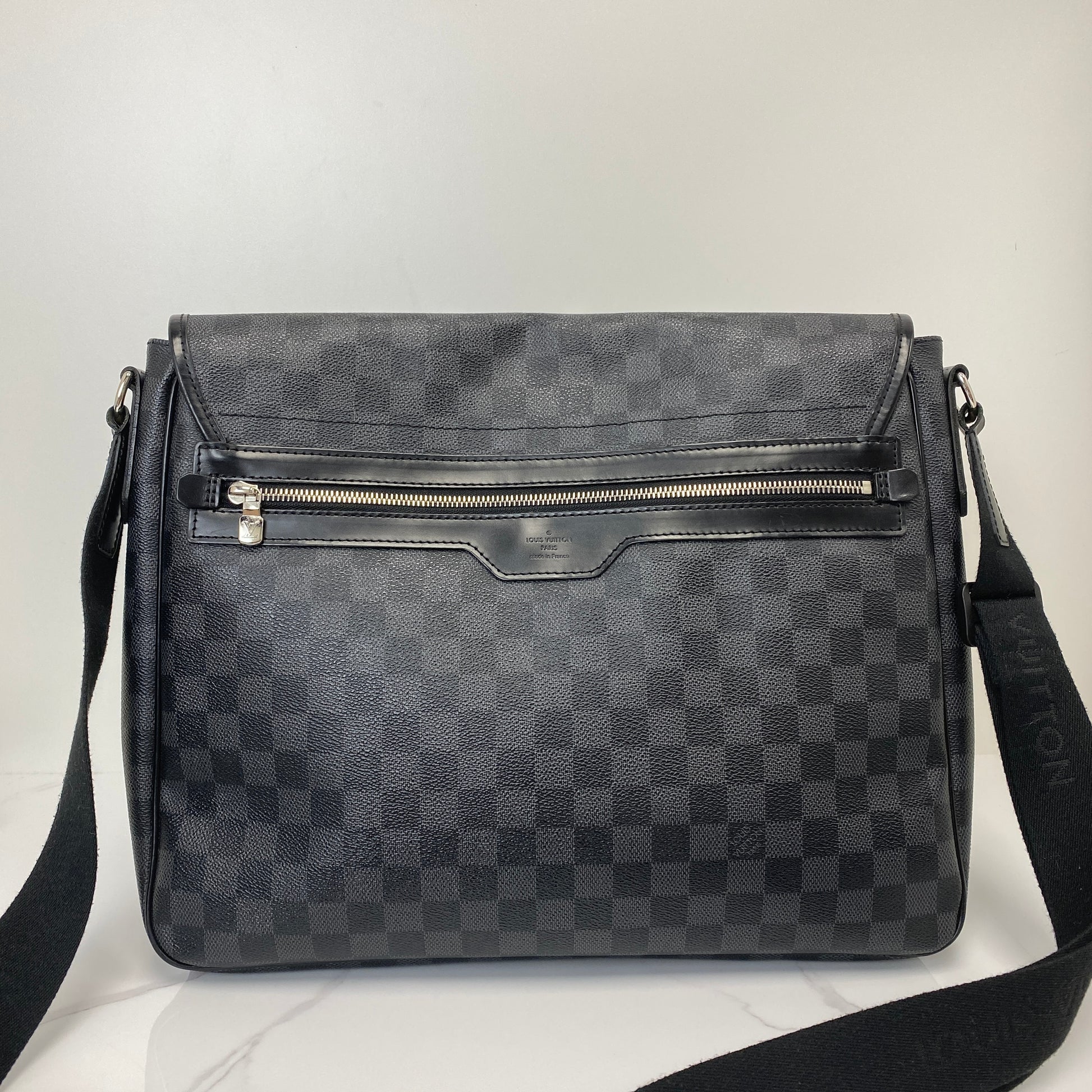 Louis Vuitton Damier Graphite messenger shown with its dustbag