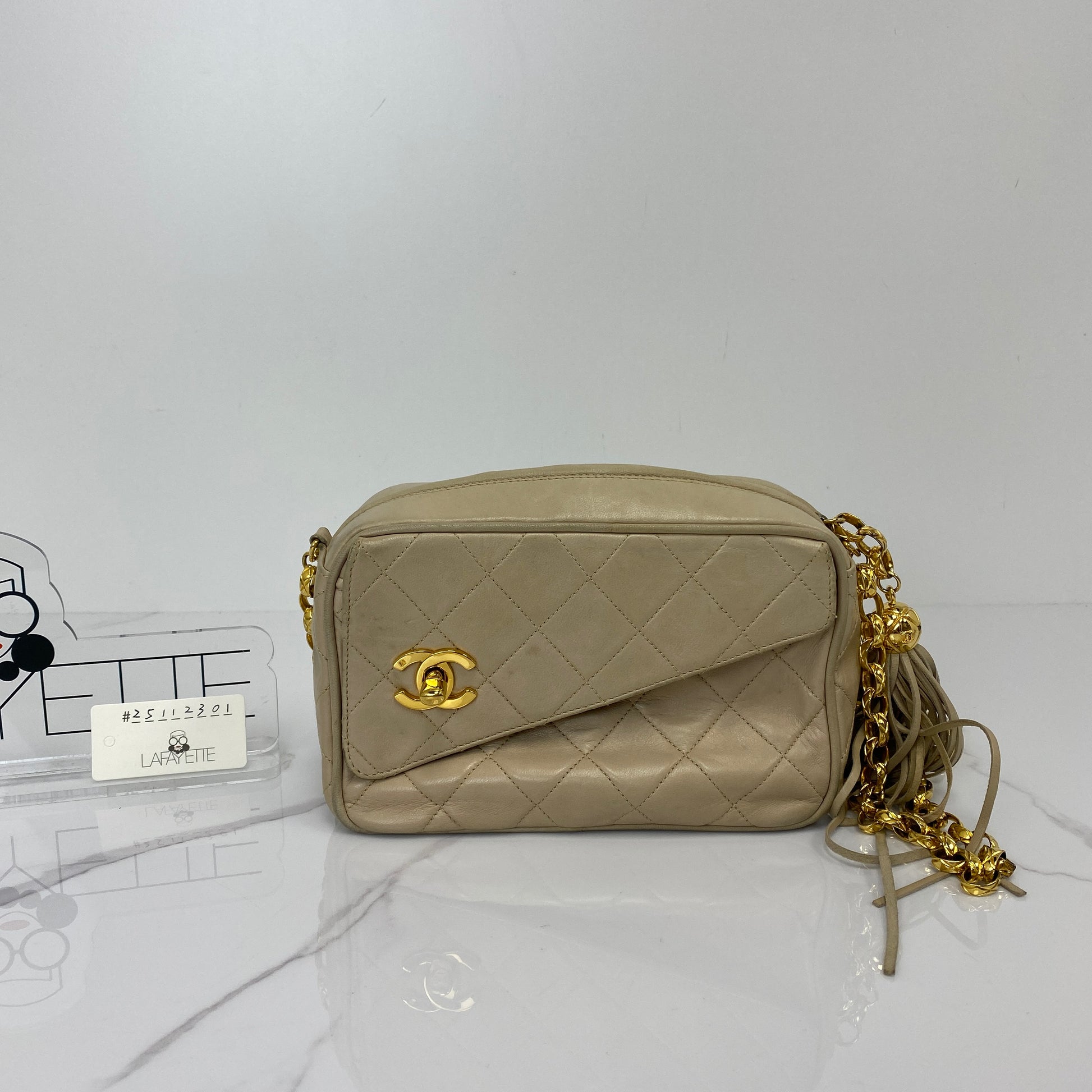 Front view of the beige Chanel vintage shoulder bag