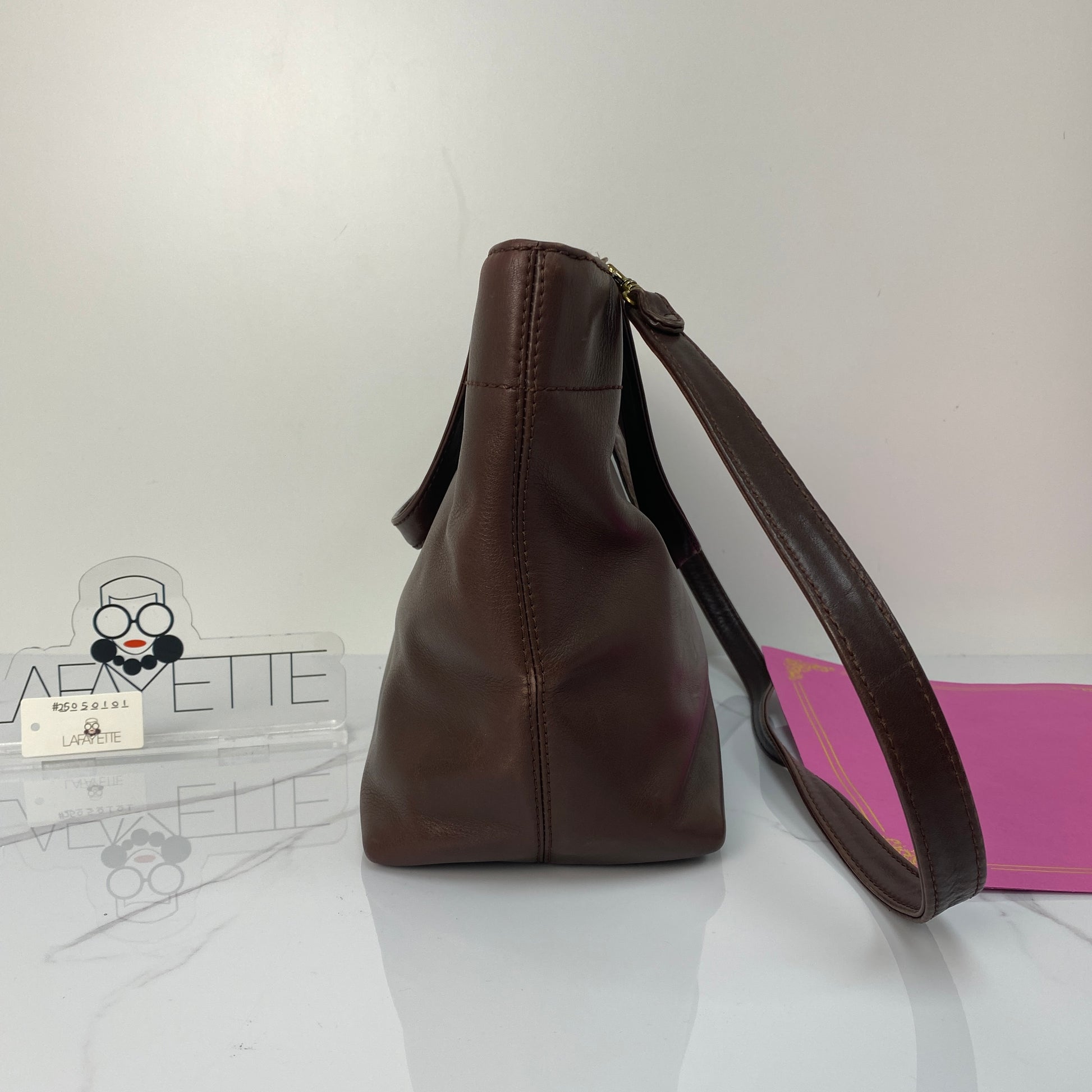 Front view of the brown Chanel vintage tote