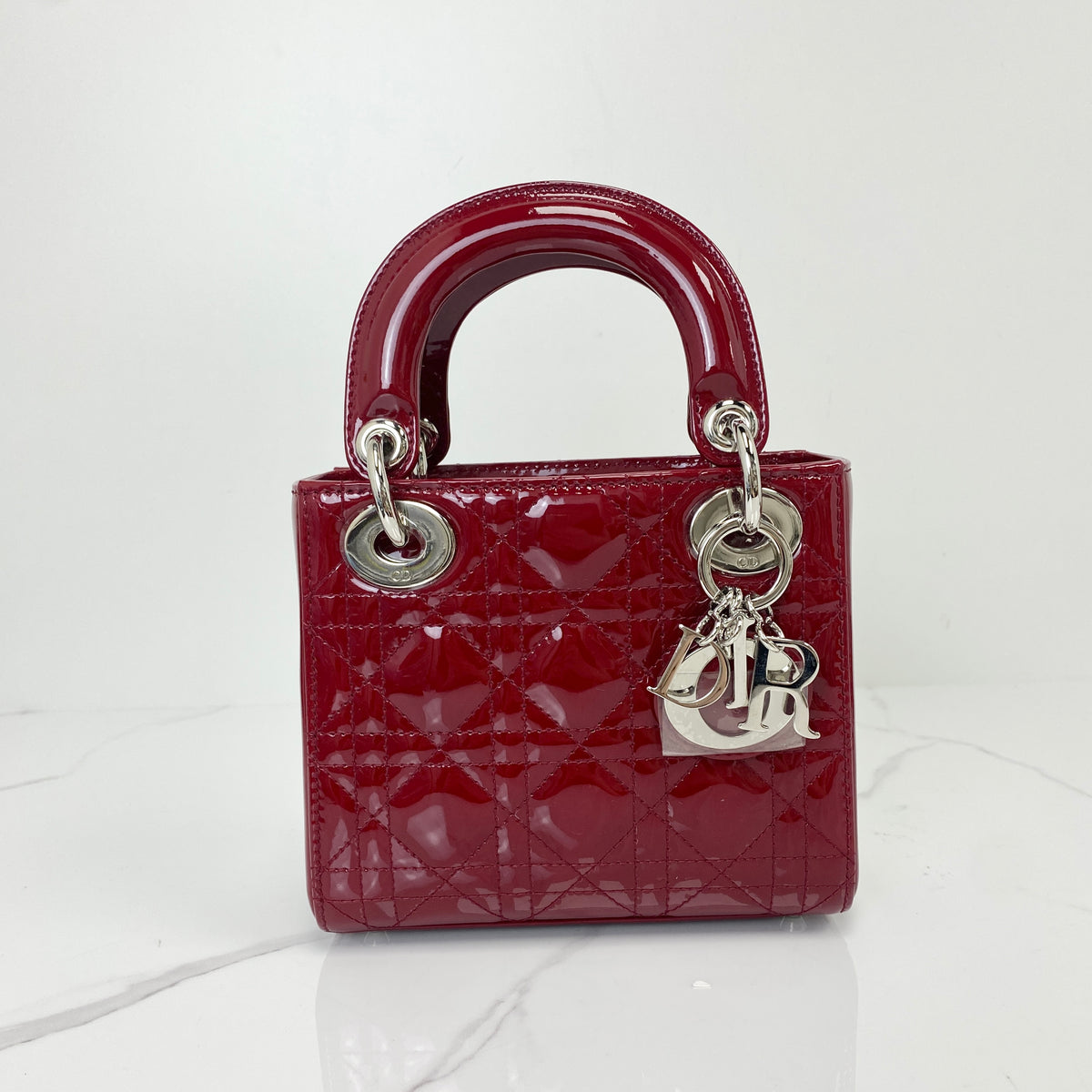 Christian Dior Mini Lady Dior Bag, cherry red patent Cannage calfskin, silver-tone hardware — front view
