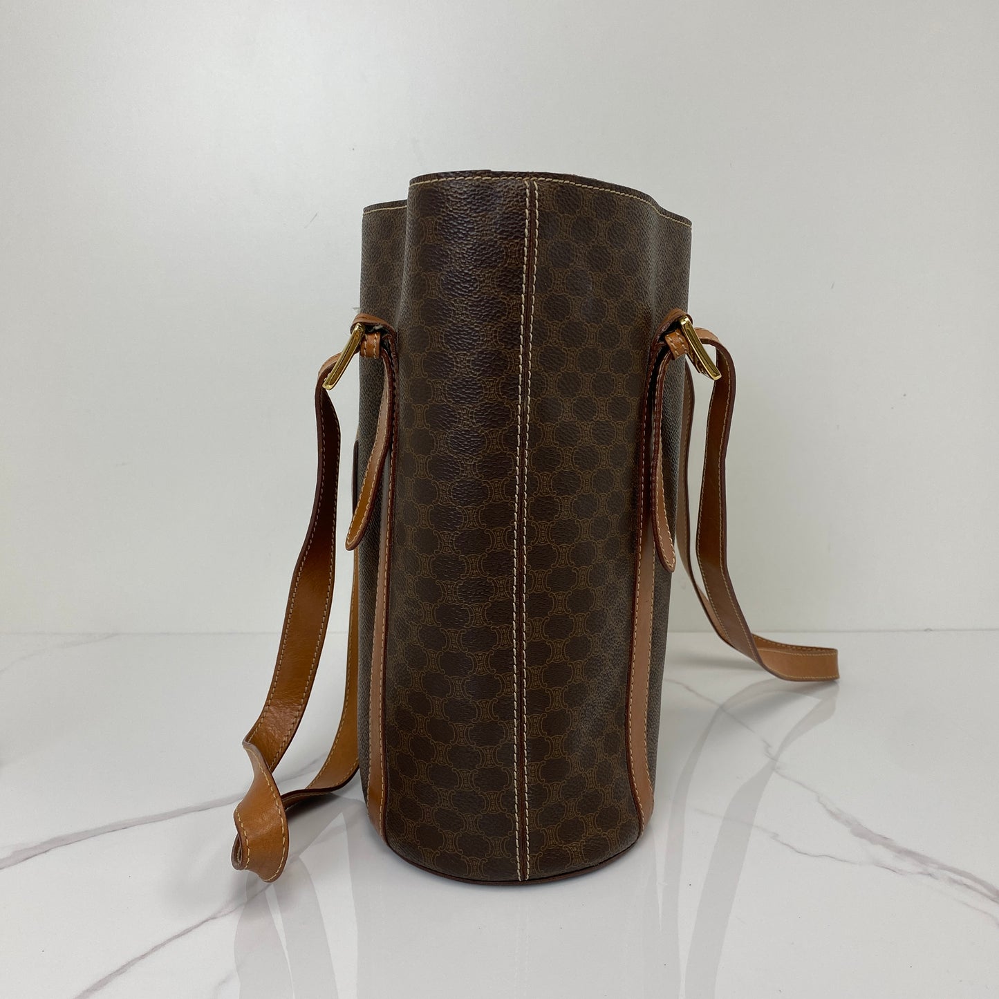 Base of the Celine Macadam bucket bag
