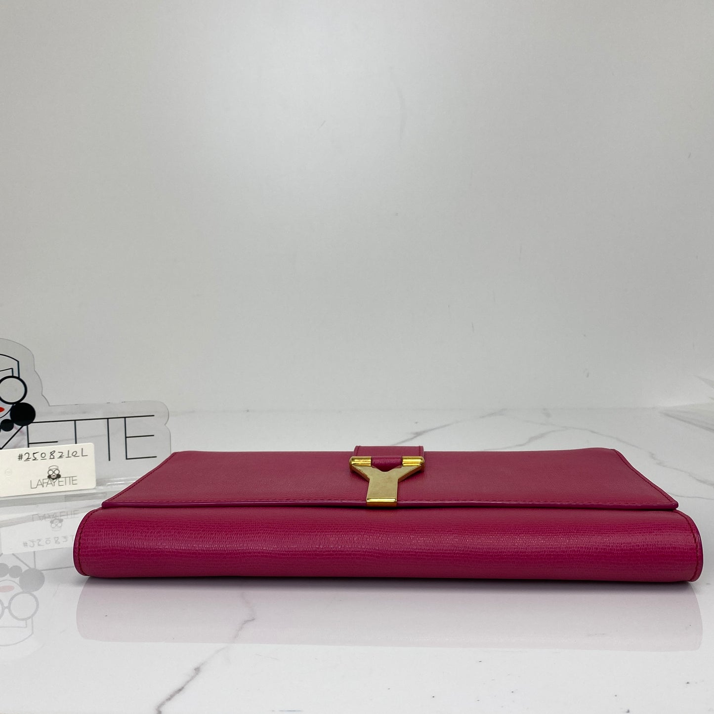 Saint Laurent Y Ligne Clutch, fuchsia pink calfskin, gold-tone Y closure — detail view 4