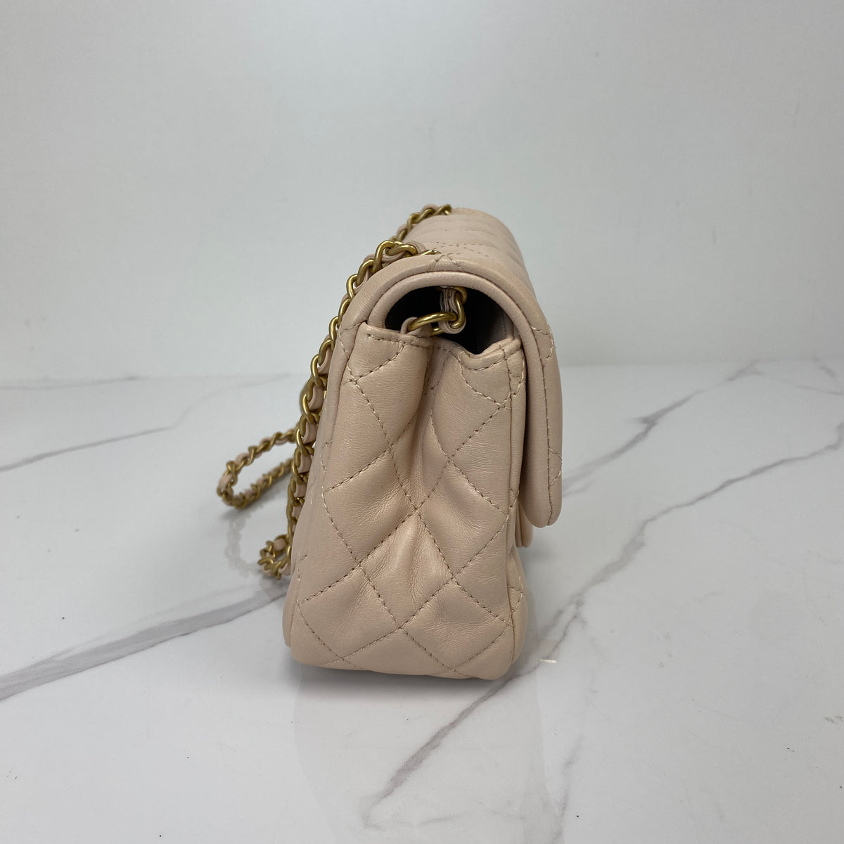 Chanel Mini Classic Flap with Pearl Crush, pink lambskin, antique gold-tone hardware, pearl chain — detail view 2