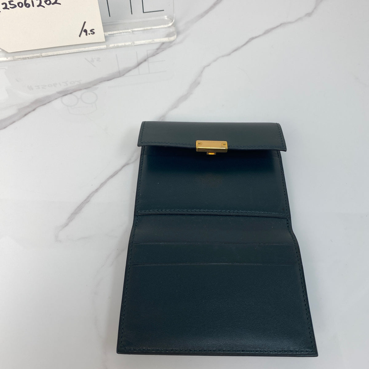 Hermès Clic 12 Wallet, black Swift calfskin, gold hardware — detail view 6