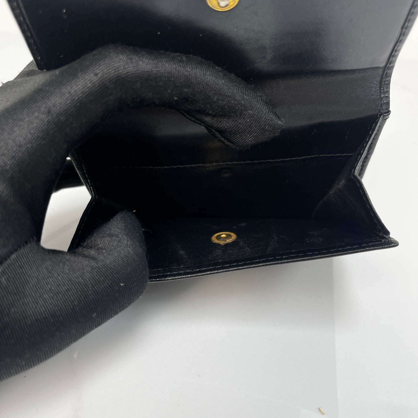 Salvatore Ferragamo Vara Bow Wallet, black calfskin, antique gold-tone Vara bow — detail view 6