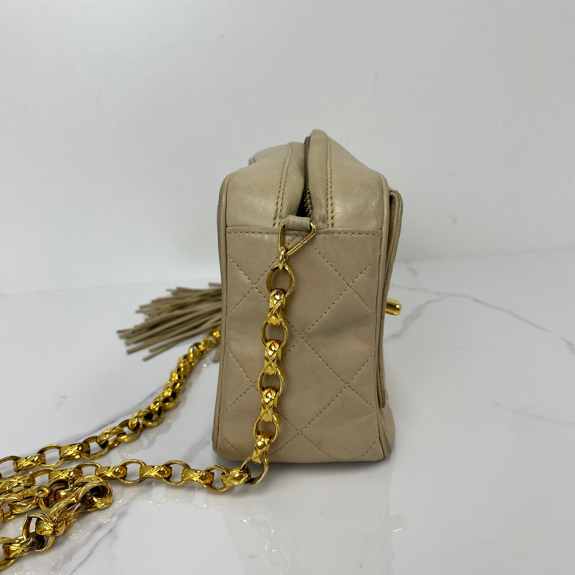Side profile of the vintage Chanel lambskin shoulder bag