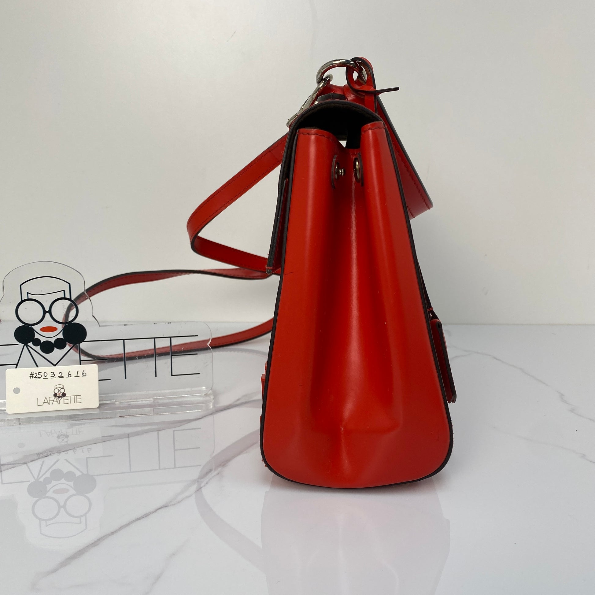 Front view of the red LV Epi Cluny BB flap bag