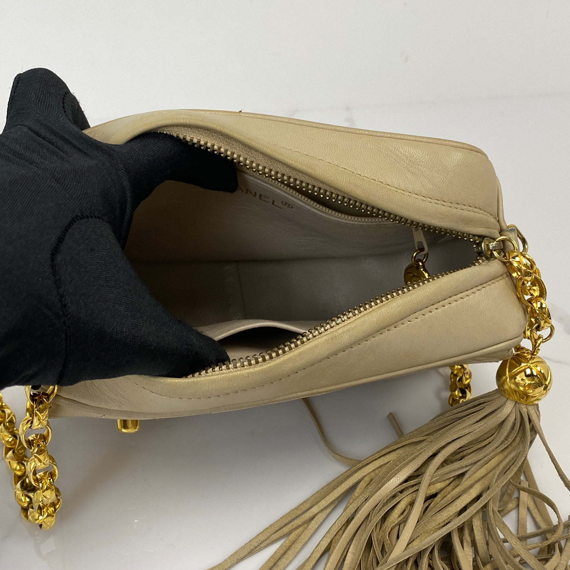 Chanel vintage shoulder bag shown with its Entrupy certification