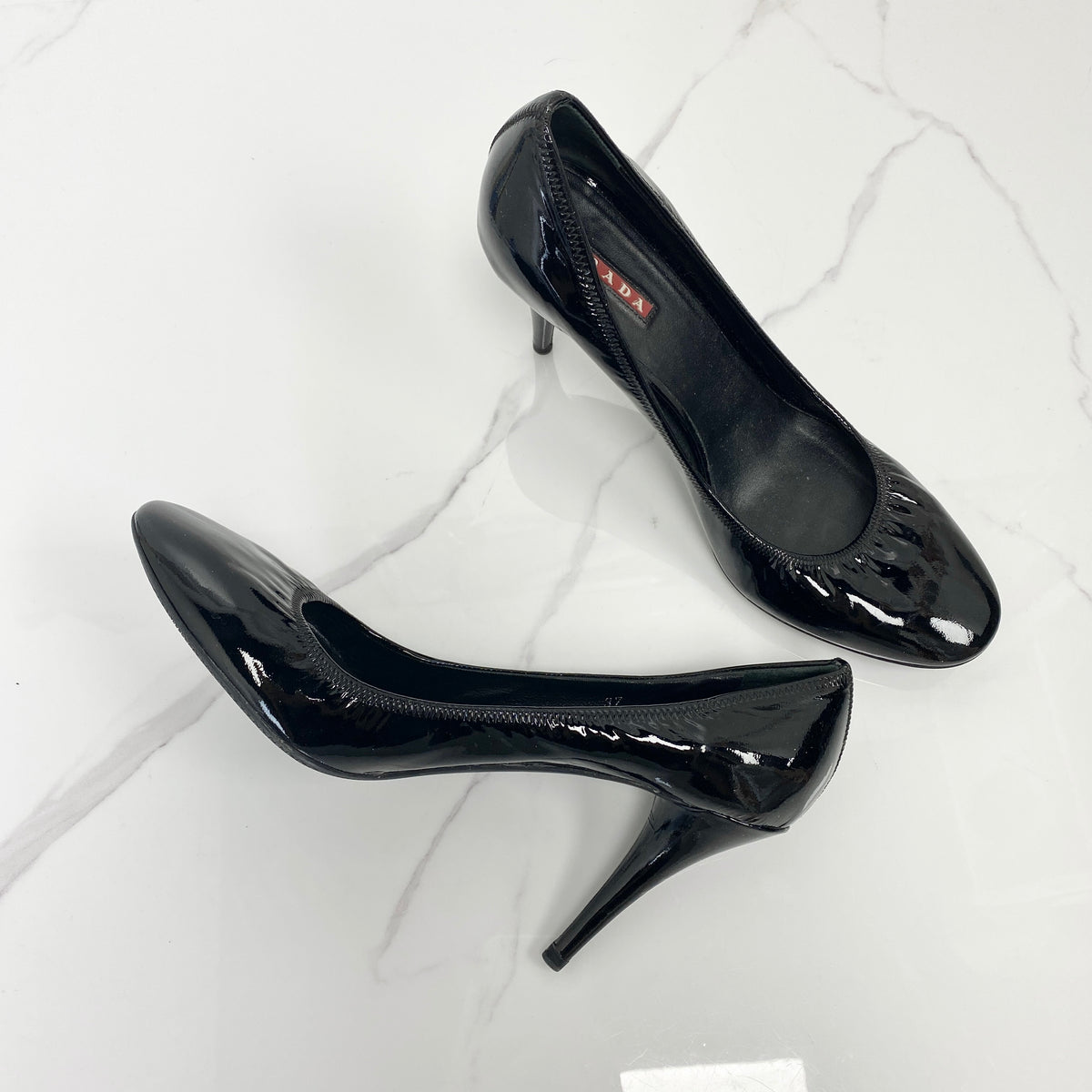 Prada Black Patent Leather Pumps, black patent leather — front view