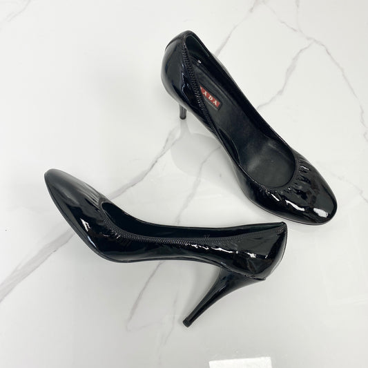 Prada Black Patent Leather Pumps, black patent leather — front view