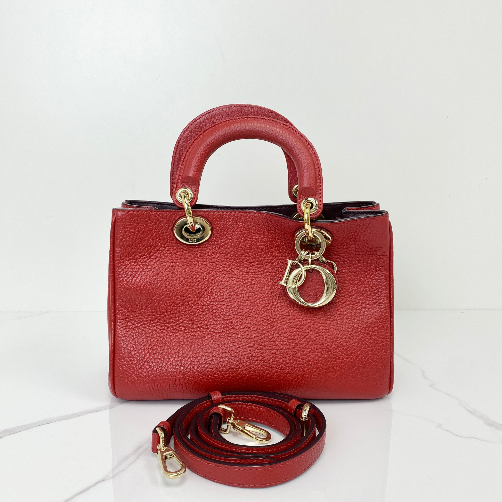 Christian Dior Mini Diorissimo in red calfskin with gold-tone hardware