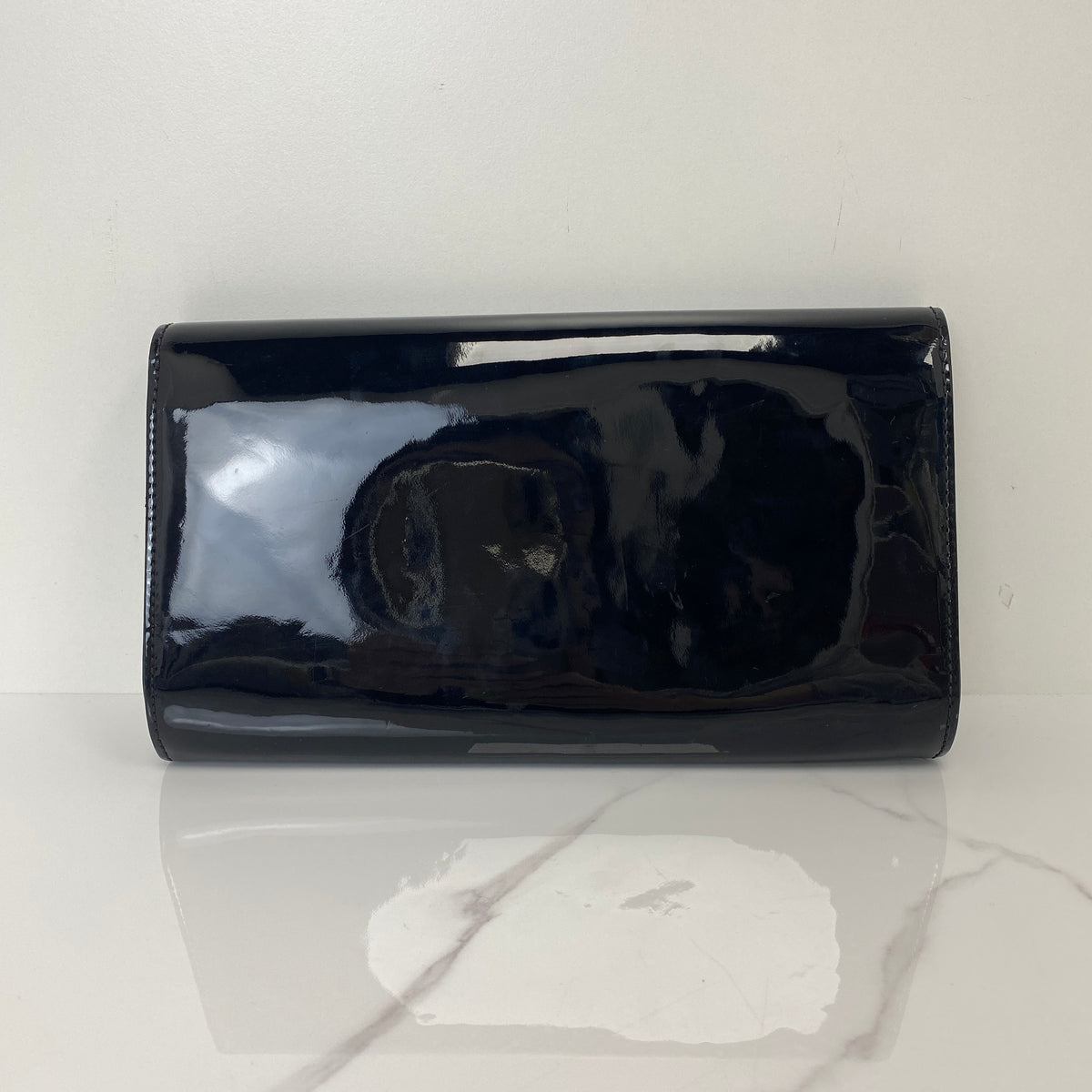 Louis Vuitton Louise Patent Leather Clutch Bag, black patent leather, gold-tone LV clasp — detail view 3