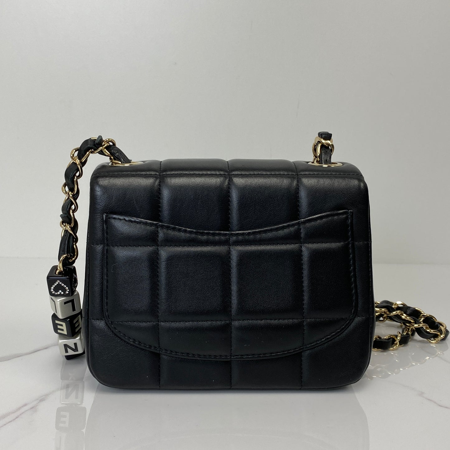 Back view of the Chanel 23C mini flap showing the square quilting