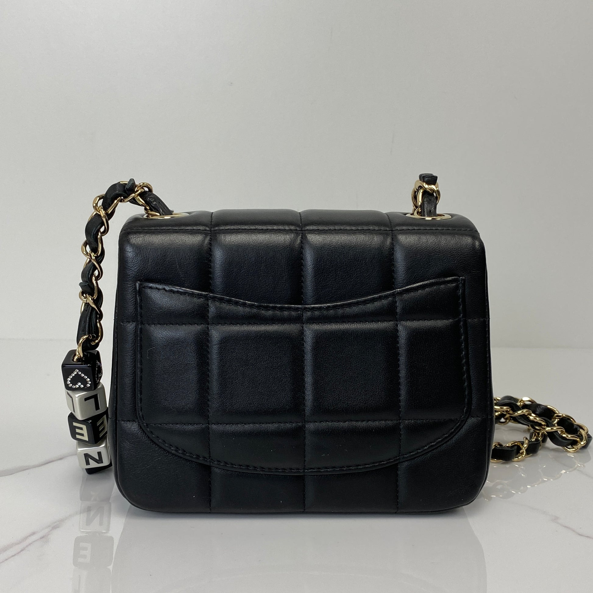 Back view of the Chanel 23C mini flap showing the square quilting