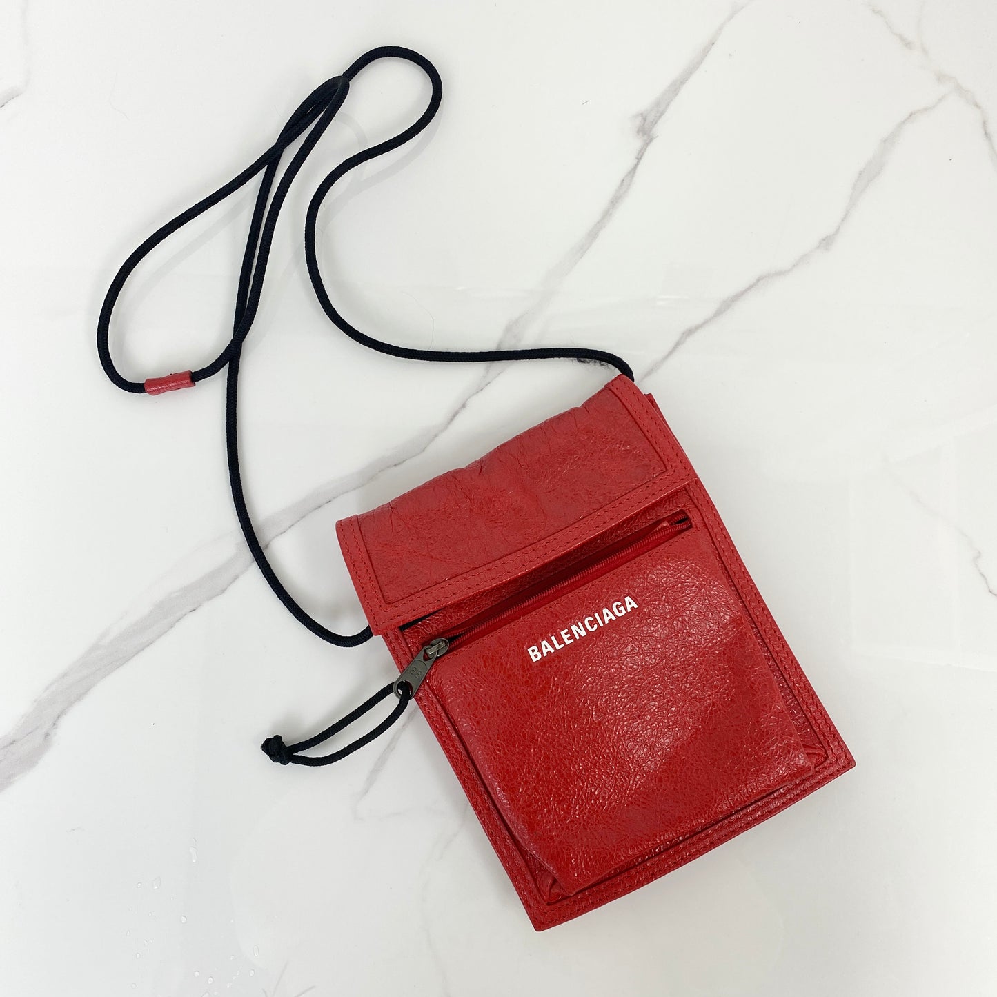 Balenciaga Small Explorer Pouch with Strap, red Arena lambskin, antique silver-tone hardware — front view