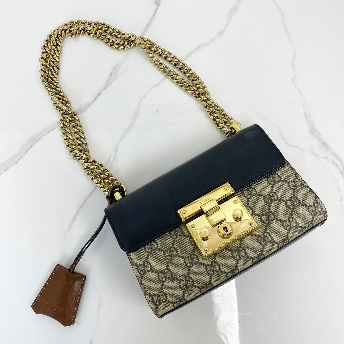 Gucci Padlock GG Supreme Shoulder Bag, black GG Supreme canvas, gold-tone padlock — front view