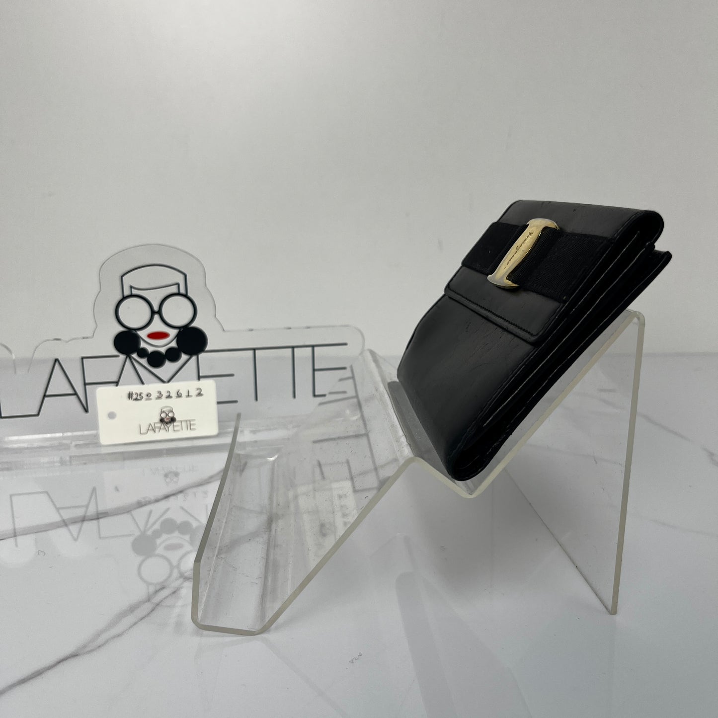 Salvatore Ferragamo Vara Bow Wallet, black calfskin, antique gold-tone Vara bow — detail view 4
