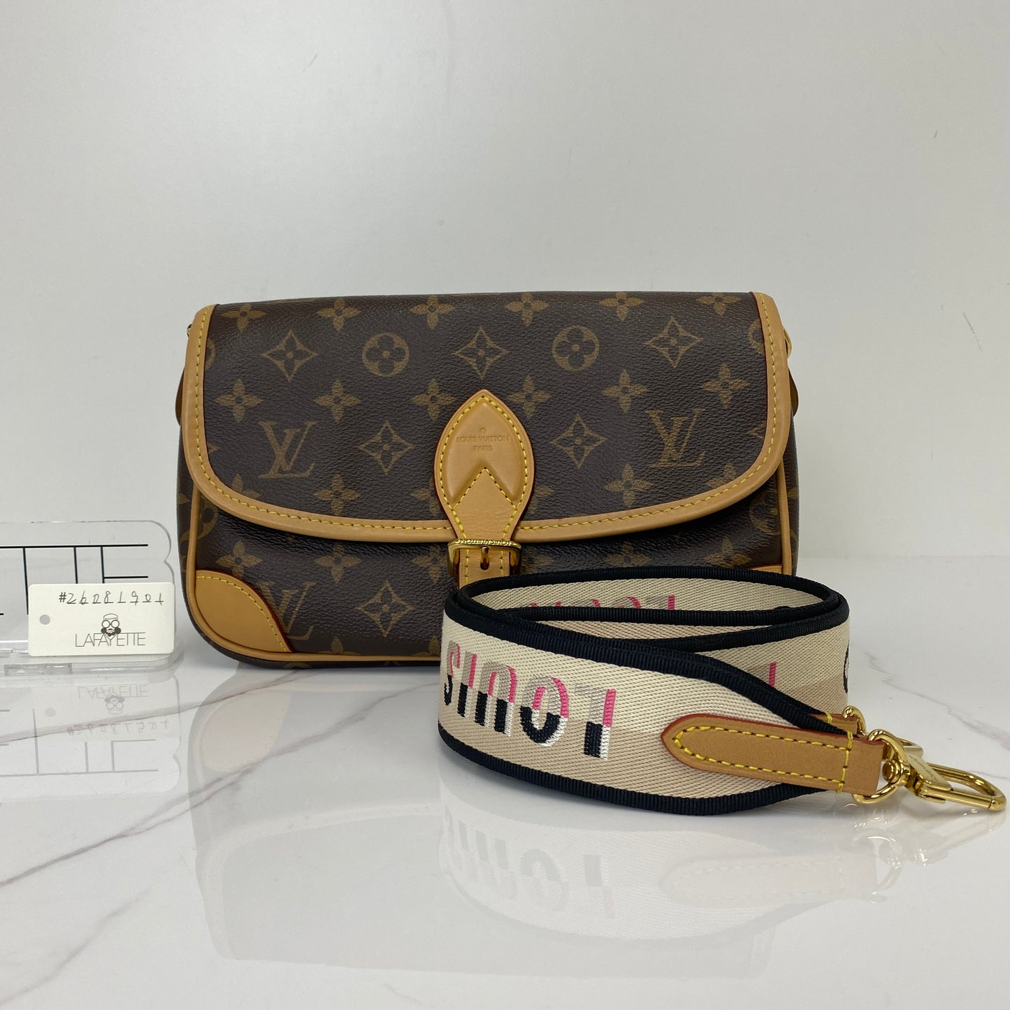 Louis Vuitton Diane shown with its included jacquard shoulder strap