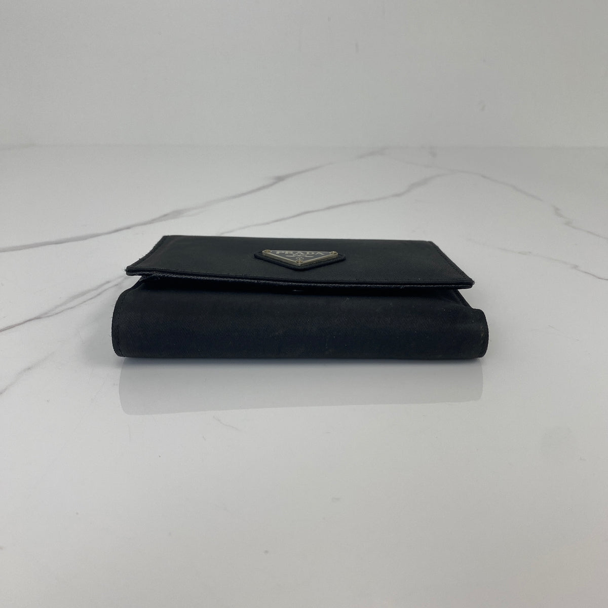Prada Tessuto Compact Wallet, black Tessuto nylon, silver-tone triangle logo — detail view 4