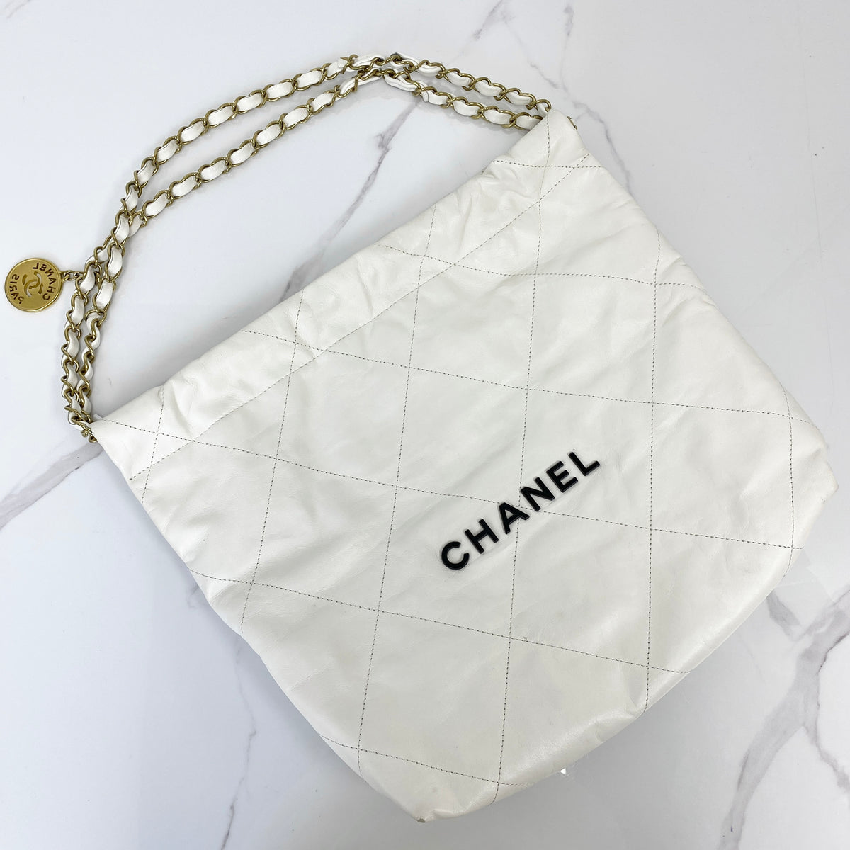 Chanel Small 22 Bag, white shiny calfskin, gold-tone chain — front view