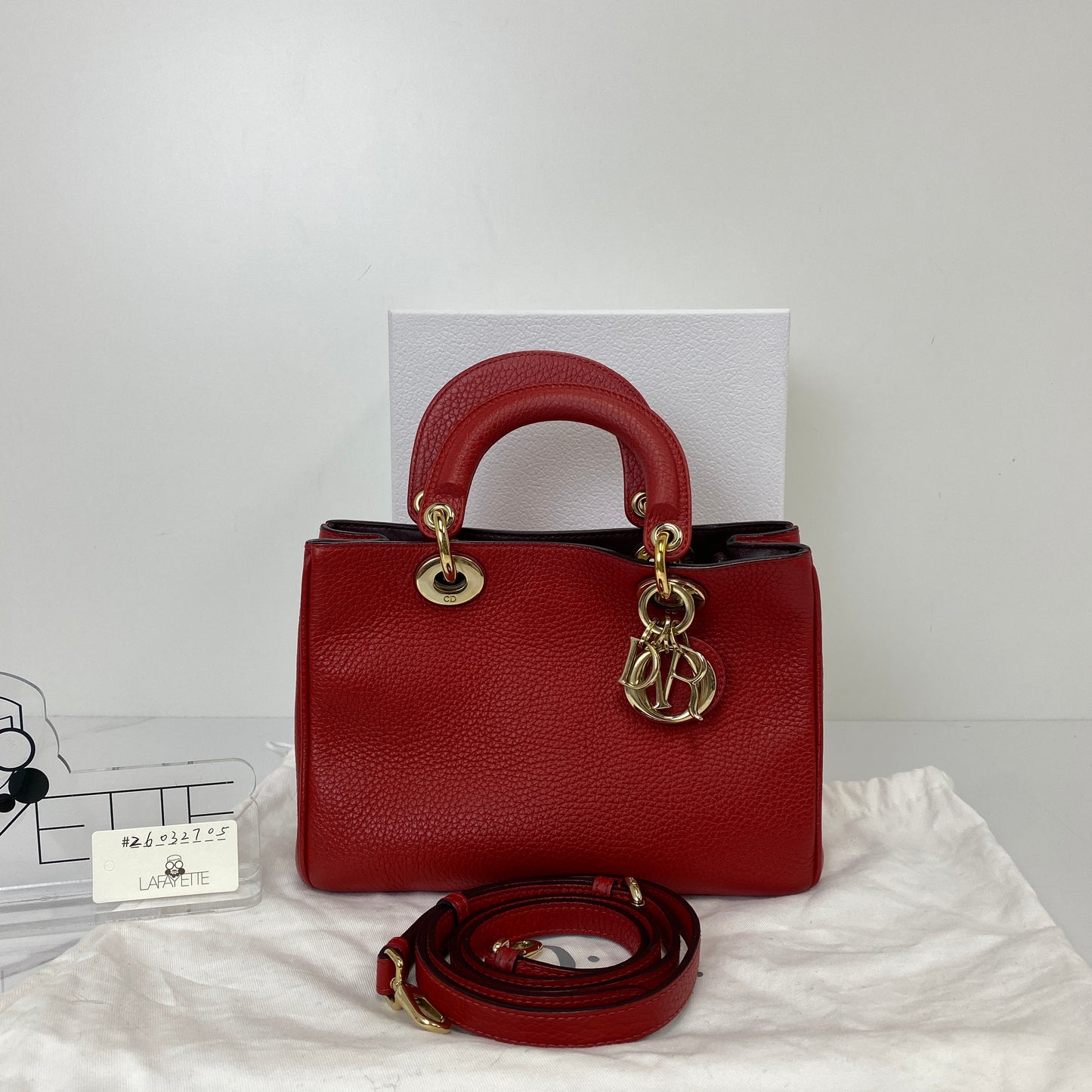 Front view of the red Dior Mini Diorissimo