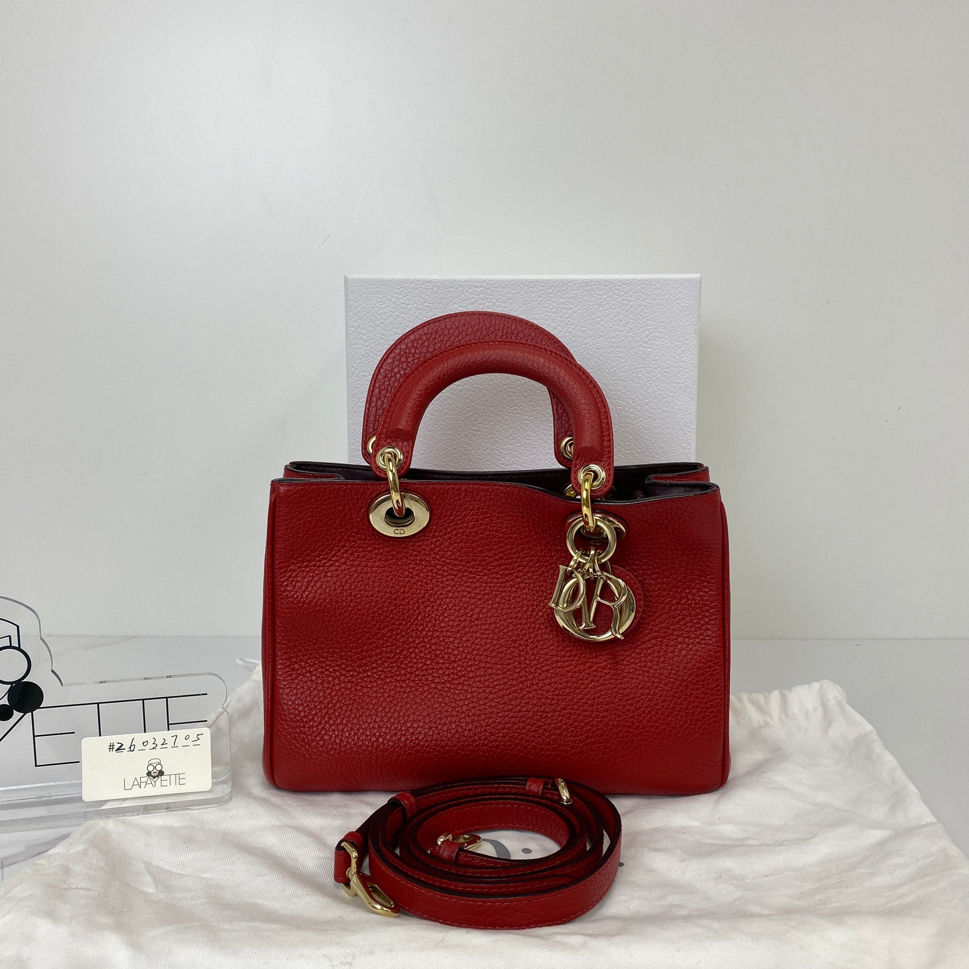 Front view of the red Dior Mini Diorissimo