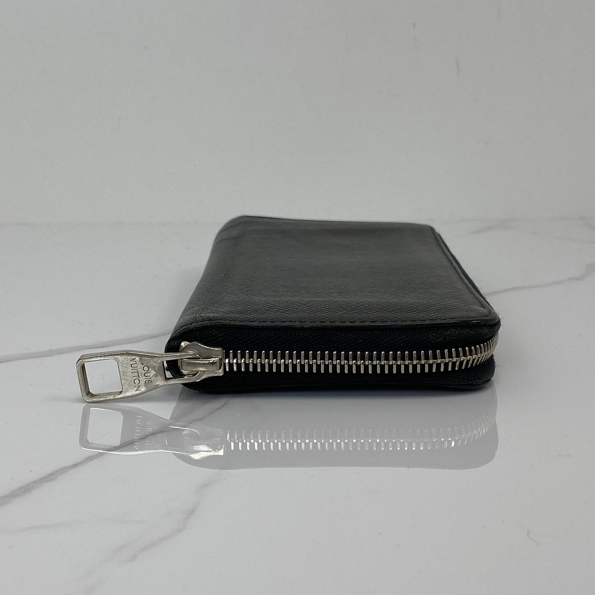 Zip detail on the Louis Vuitton long wallet