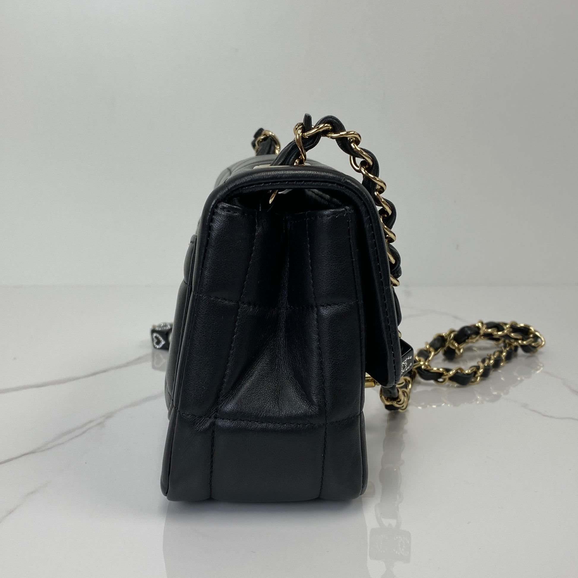 Side profile of the Chanel 23C mini flap bag