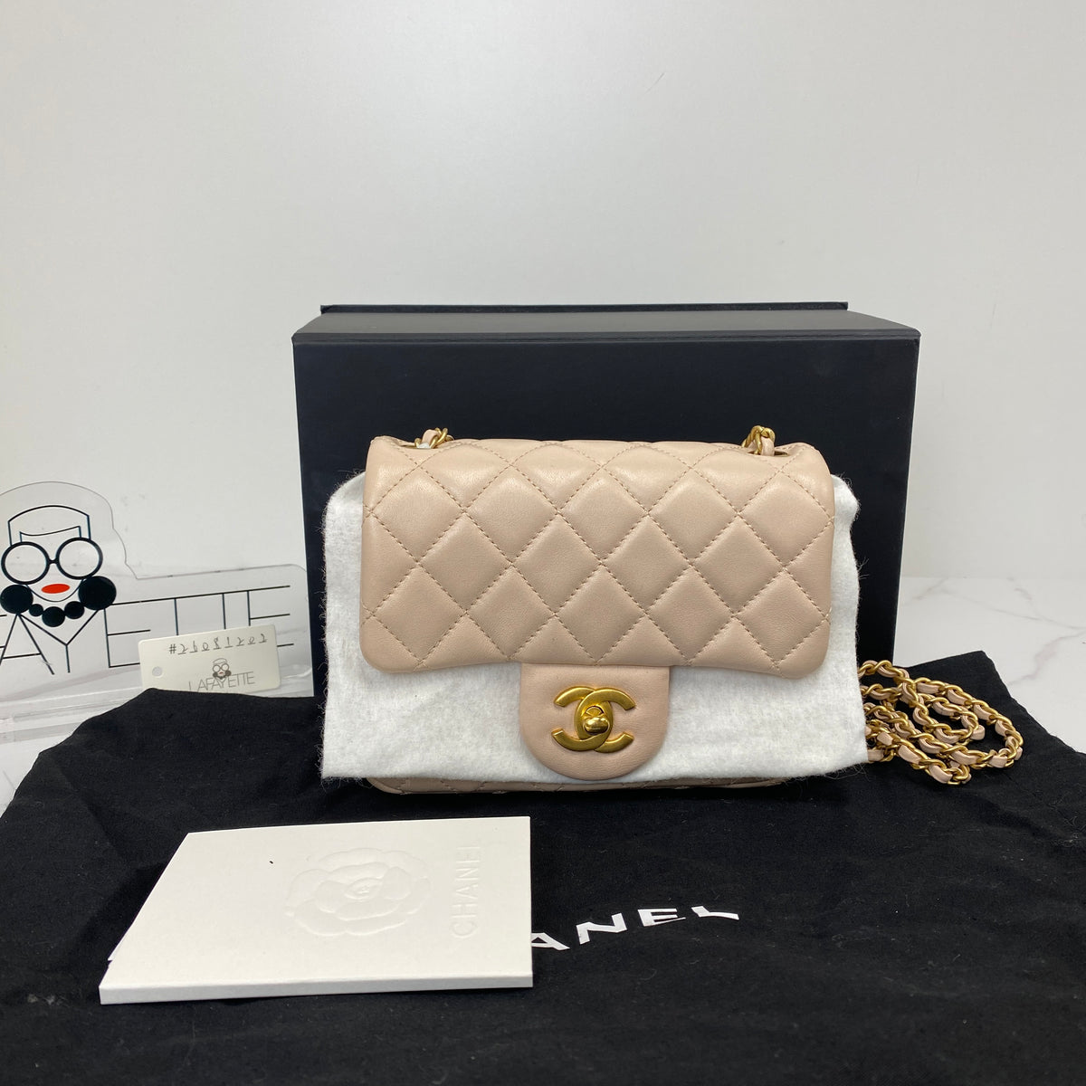 Chanel Mini Classic Flap with Pearl Crush, pink lambskin, antique gold-tone hardware, pearl chain — detail view 1