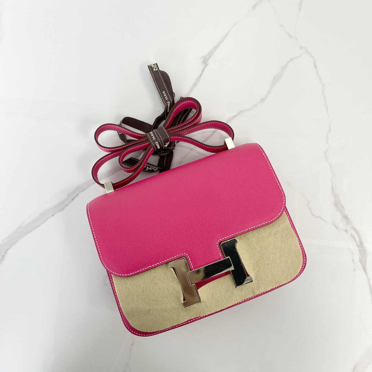 Hermès Constance 24, pink Epsom calfskin, palladium hardware — front view