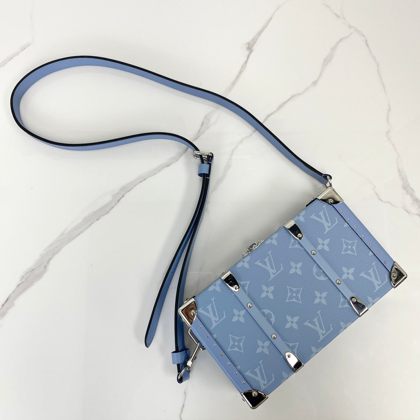 Louis Vuitton Wallet Trunk Taigarama in denim blue Monogram canvas with palladium trunk corners and strap