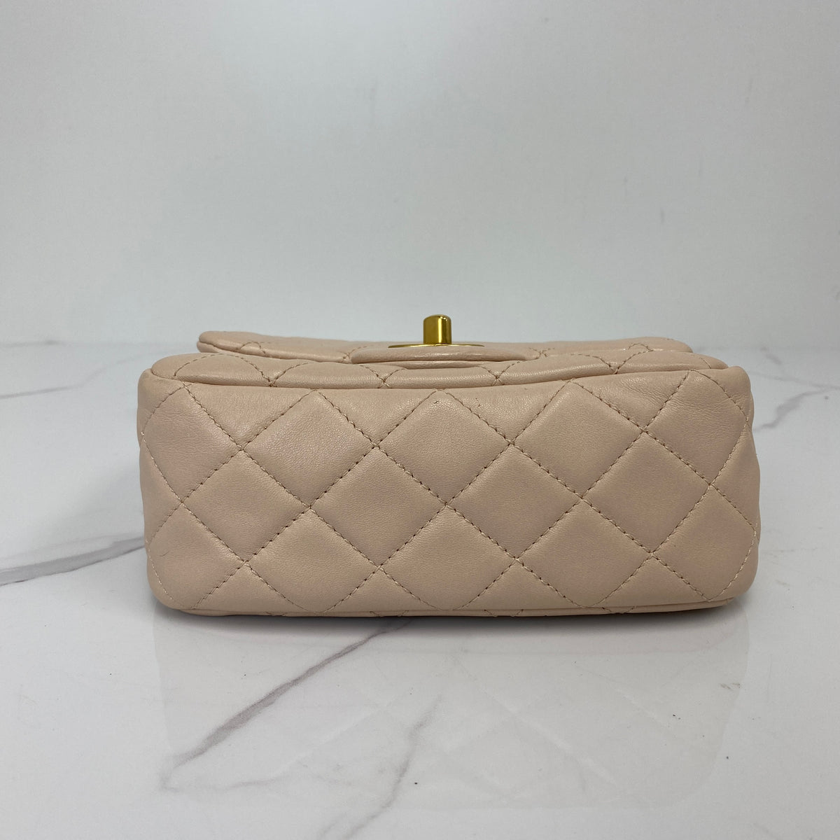 Chanel Mini Classic Flap with Pearl Crush, pink lambskin, antique gold-tone hardware, pearl chain — detail view 4