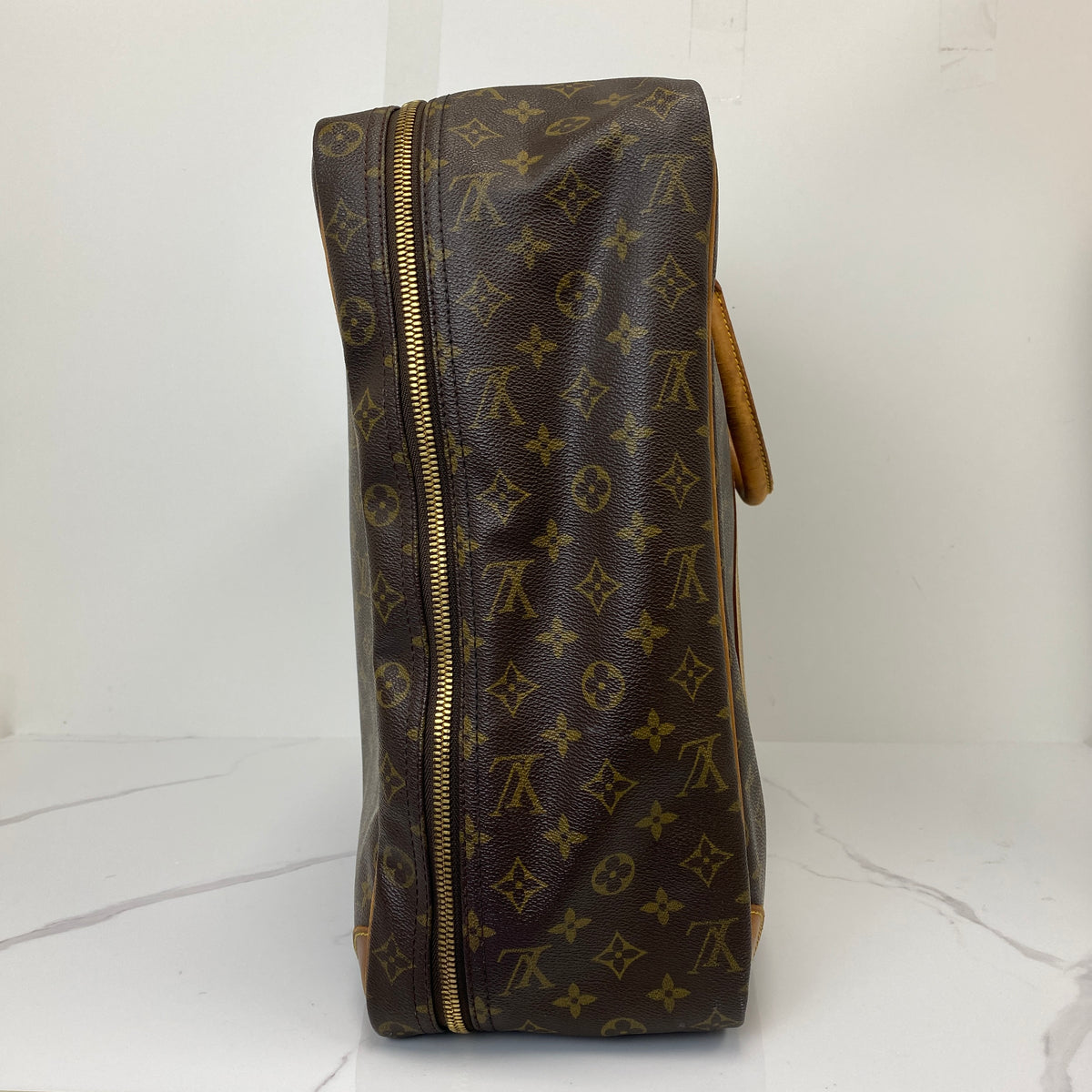 Louis Vuitton Monogram Sirius 55 Vintage Luggage Bag, brown Monogram canvas, Vachetta trim — detail view 2