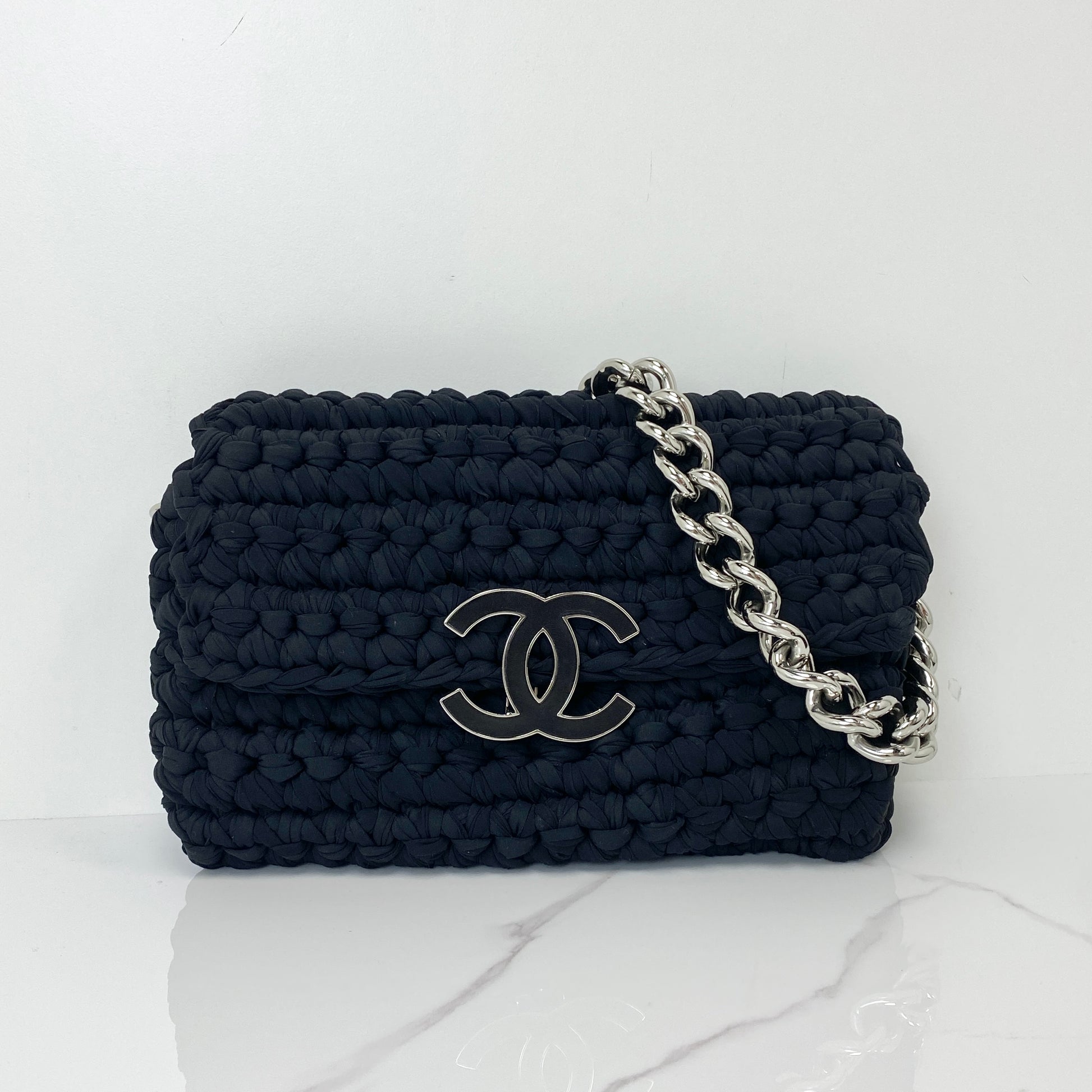 Chanel flap bag in black cotton tweed with silver-tone chain