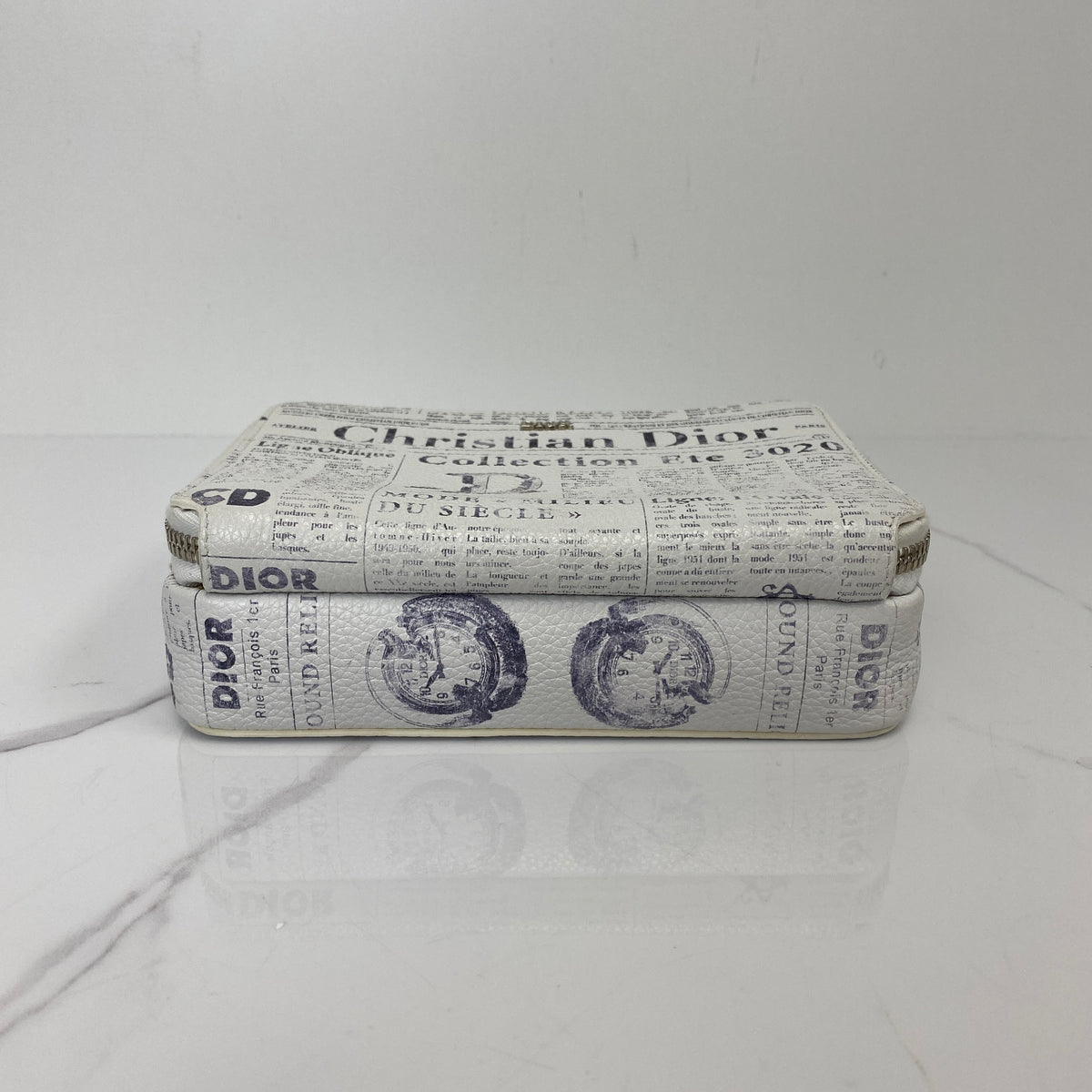 Christian Dior x Daniel Arsham Newspaper Messenger Bag, white and black newspaper-print calfskin, silver-tone hardware — detail view 4