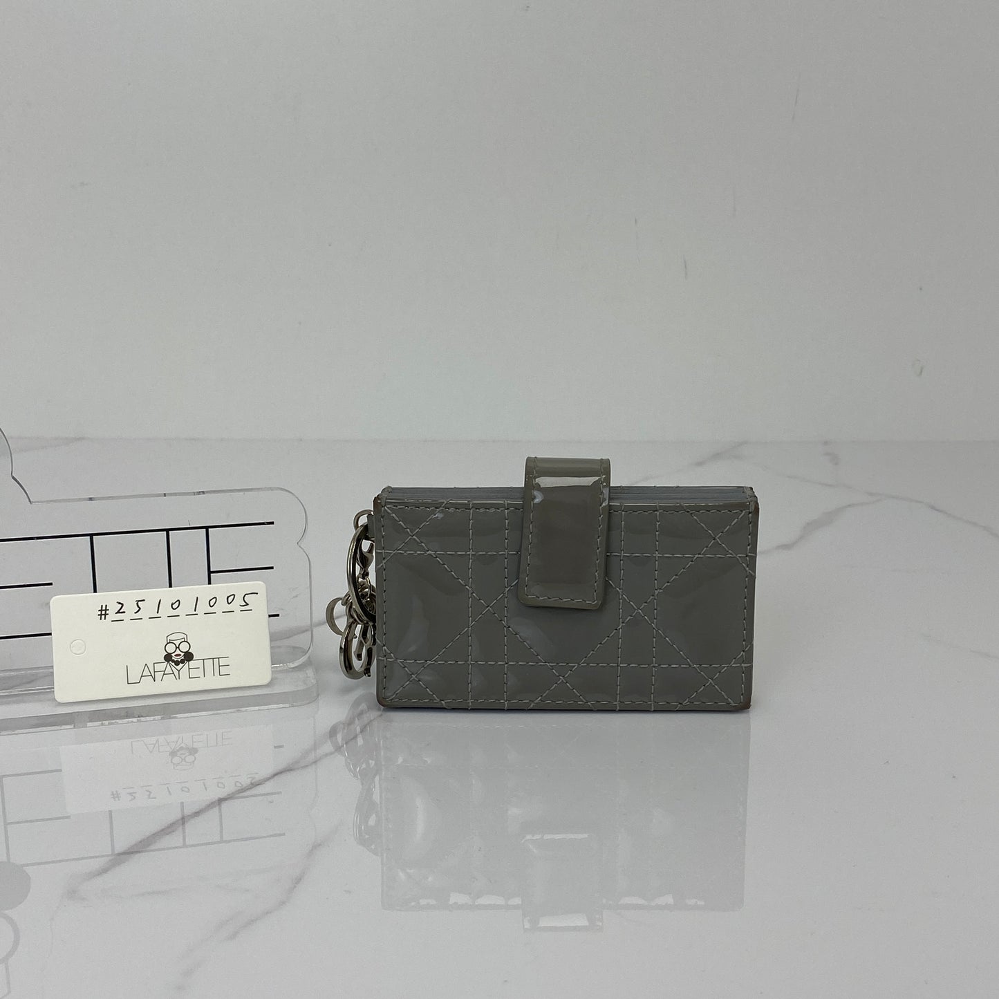 Front view of the grey Lady Dior Jasmine card holder