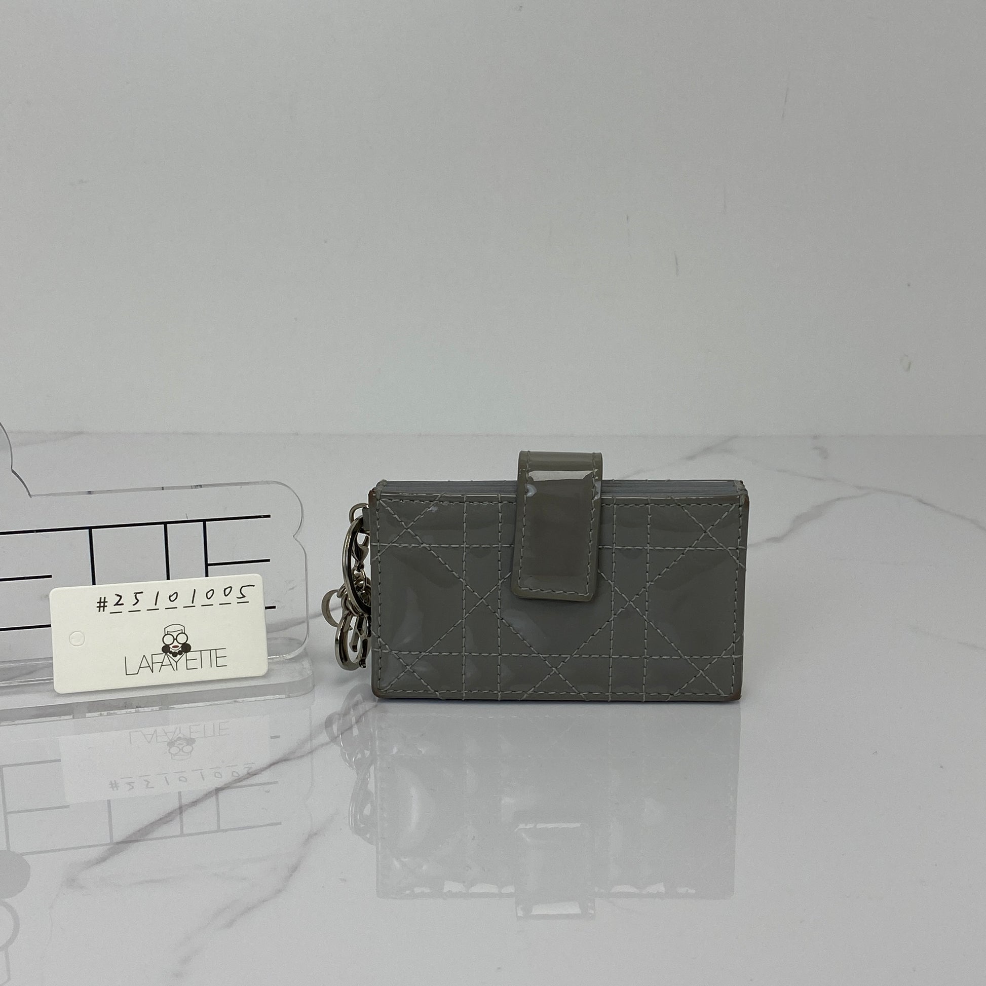 Front view of the grey Lady Dior Jasmine card holder