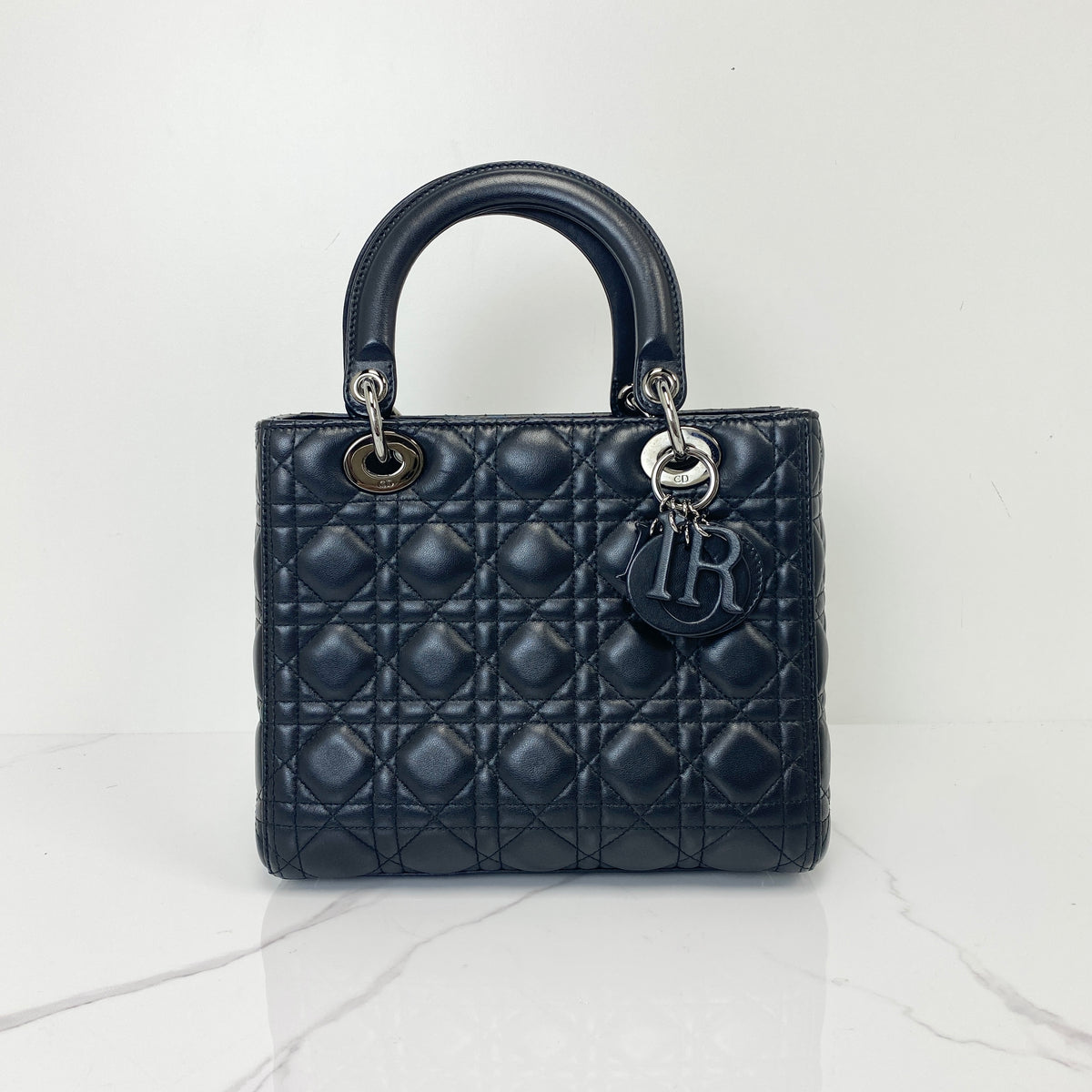 Christian Dior Medium Lady Dior, black Cannage lambskin, So Black hardware — front view