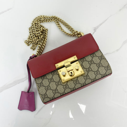 Gucci Padlock Small Shoulder Bag, red leather and GG Supreme canvas, gold-tone padlock — front view